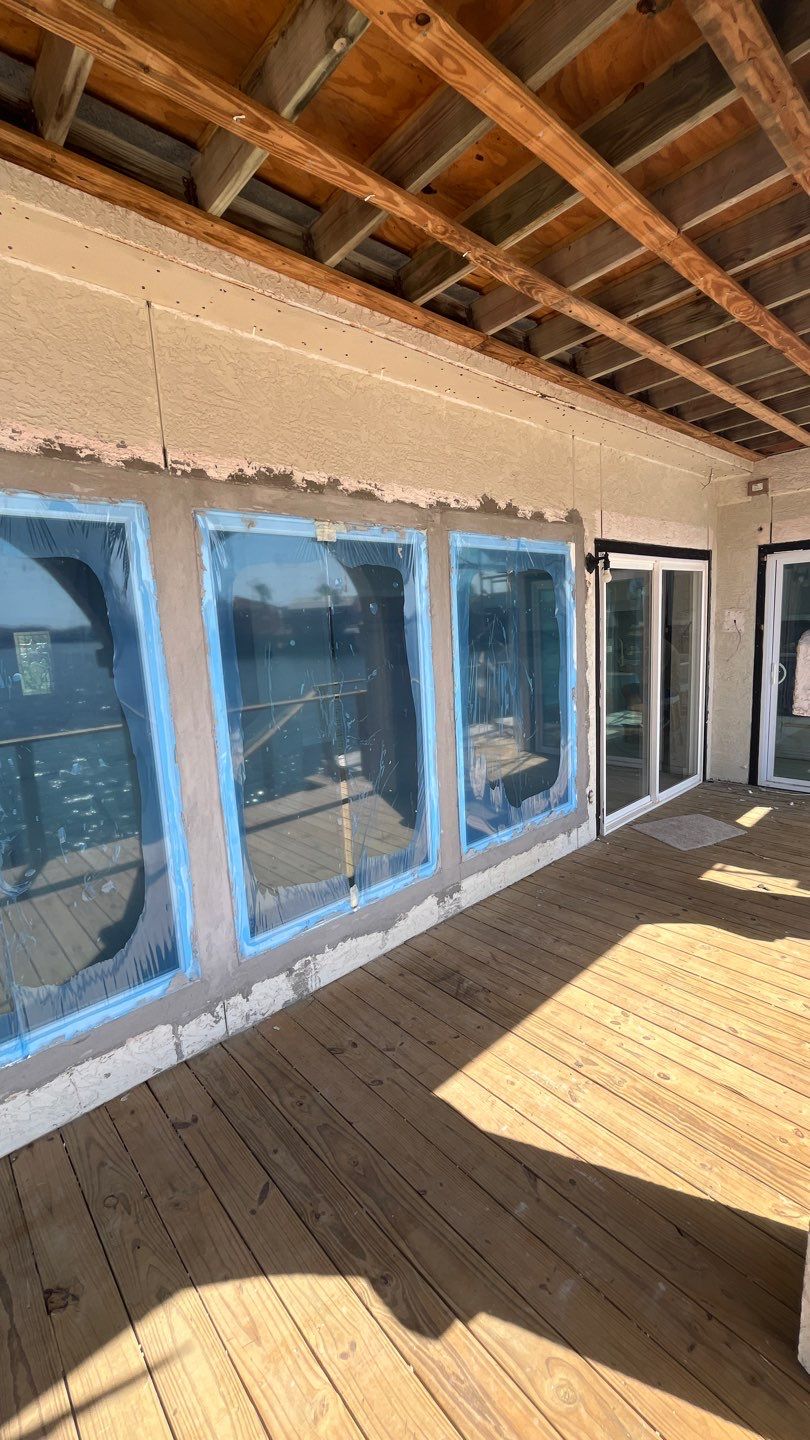 Installing Windows on a Submarine  by Bayfront Roofing and Construction