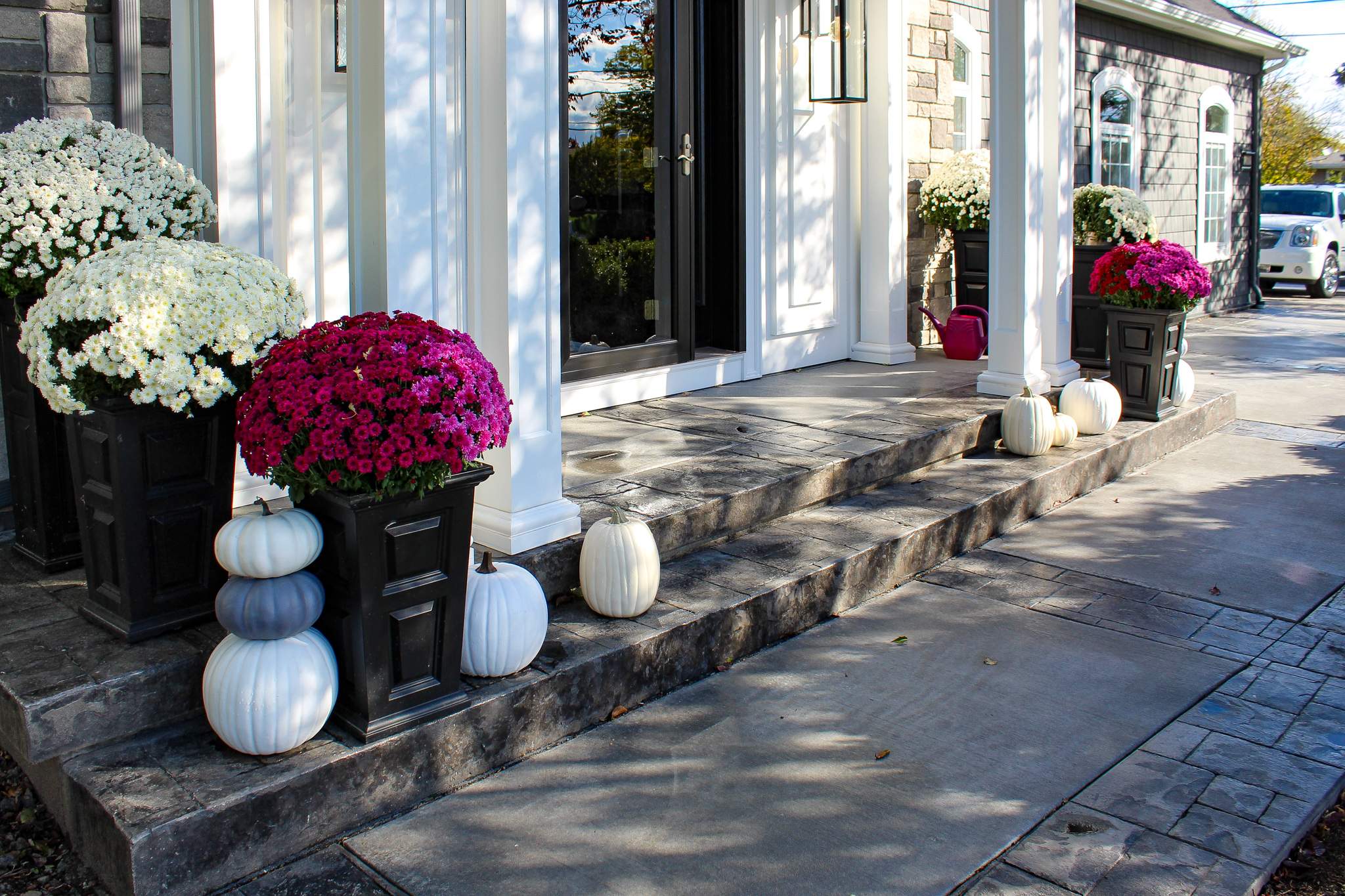 Exterior Renovations- Siding, Concrete, Railings, and Entry Door  by Ivy Lea Construction