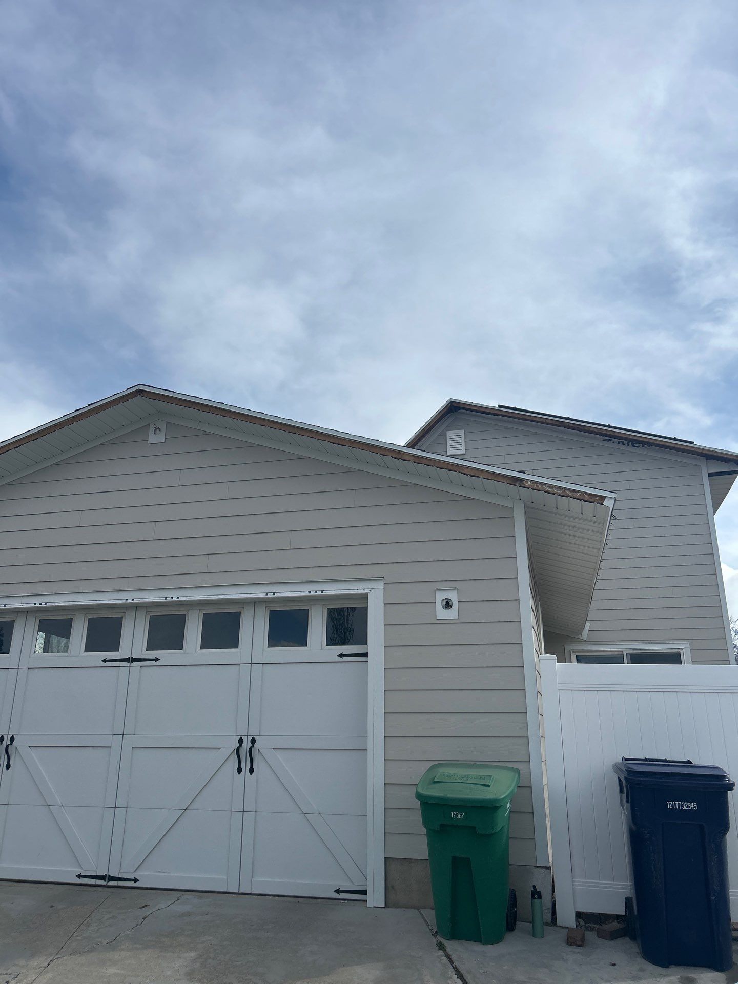 Sandy | Strategic Hardie & Vinyl Integration | Cobble Stone & Desert Sand by Ideal Siding Utah