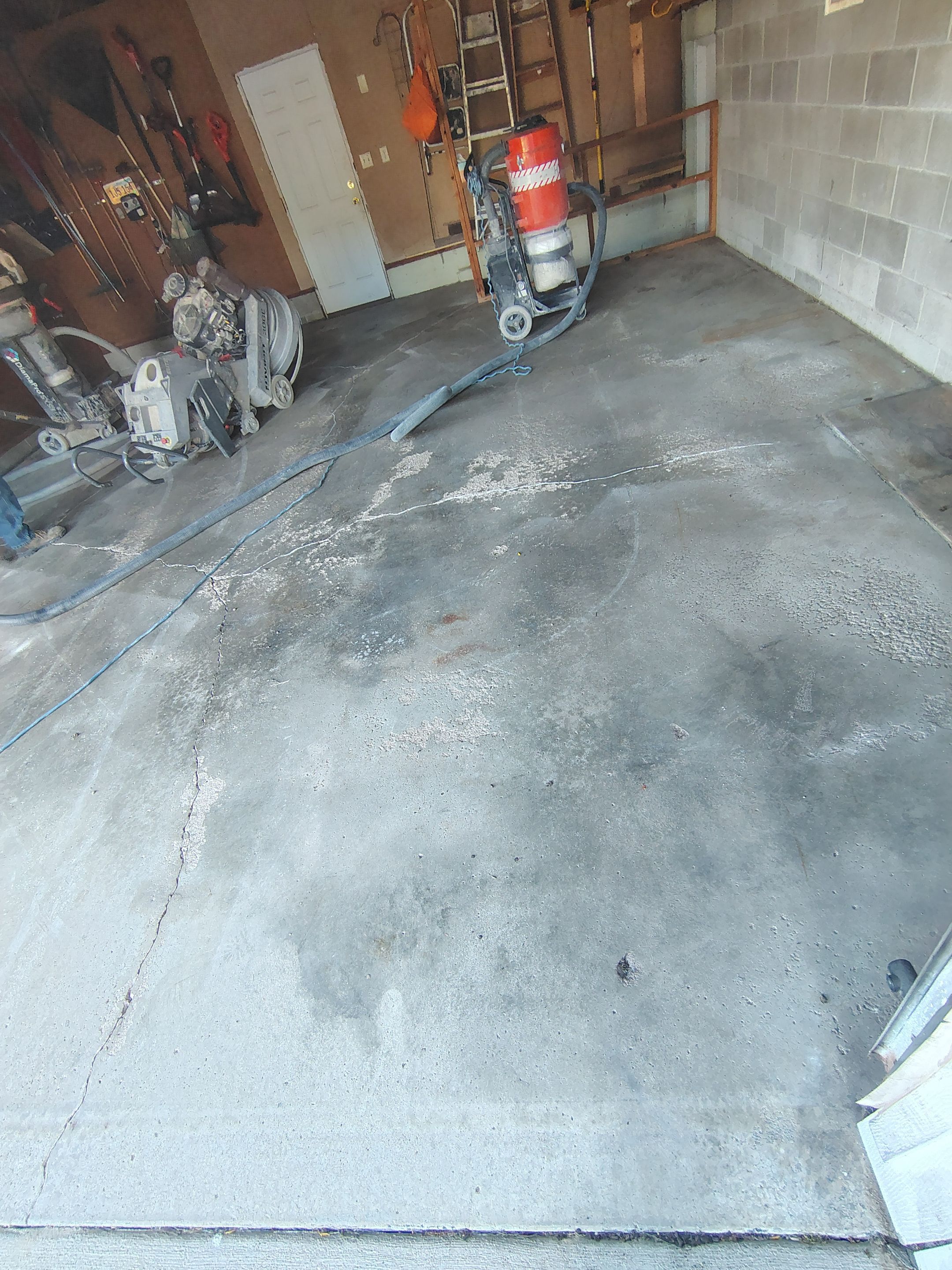 Sioux Falls Garage Epoxy Floor Installation and Concrete Crack Repair by Select Painting, Coatings & Garage Cabinets