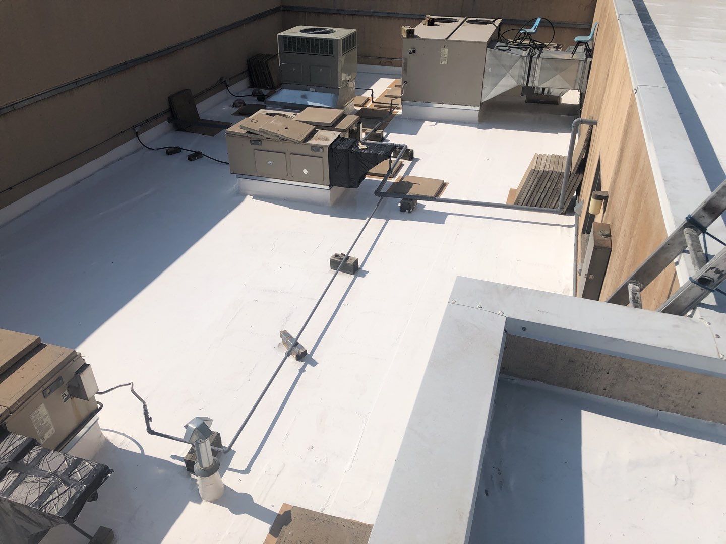 Commercial Roofing Installation using American Standard Coating - S  by A to Z Roofing