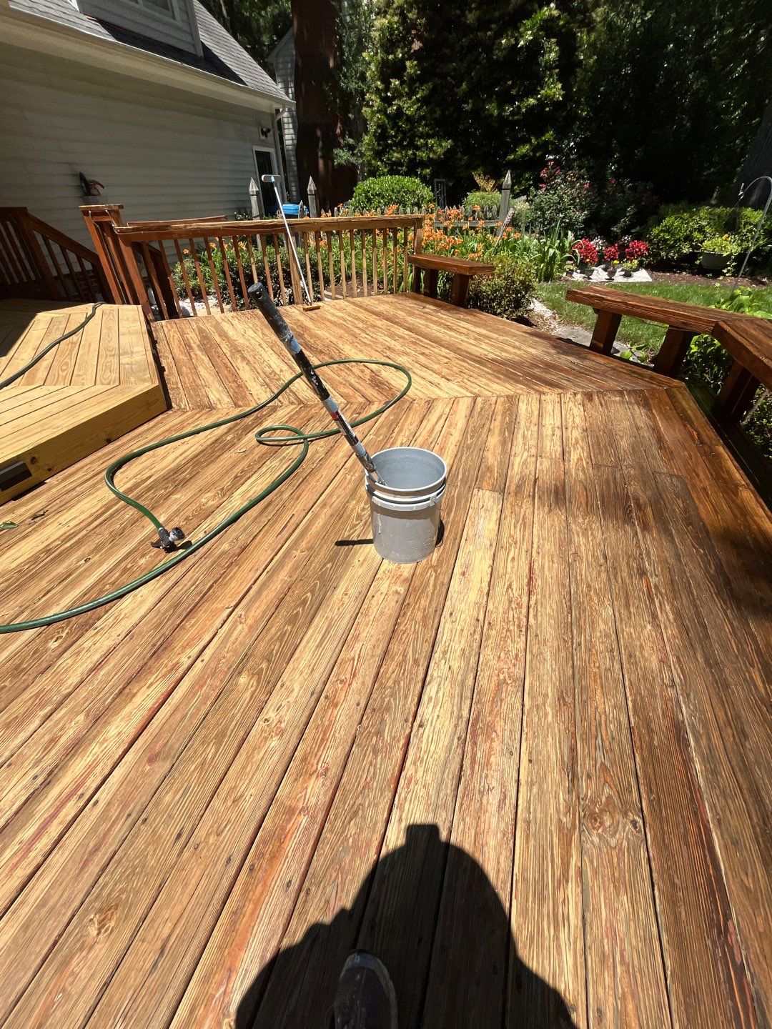 Triple deck re-staining by AKK Painting LLC