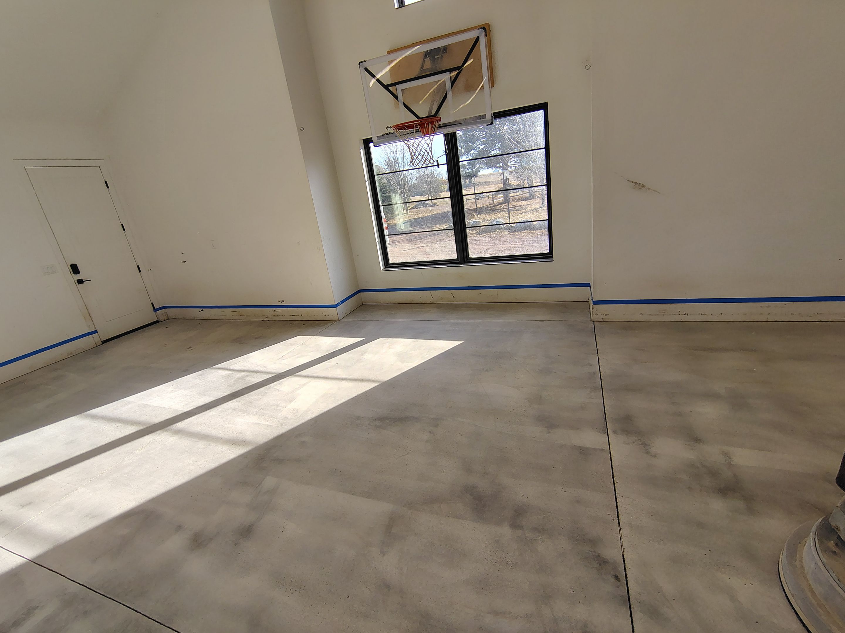 Epoxy Flake Garage Floor and Stair Coating in Sioux Falls by Select Painting, Coatings & Garage Cabinets