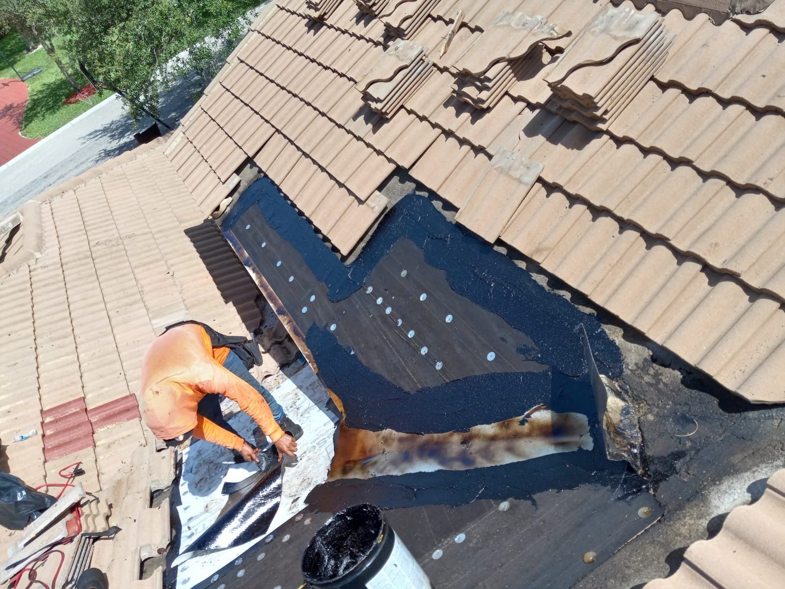 Concrete Tile Roof Leak Repair and Wood Decking Replacement in Parkland by Aastro Roofing