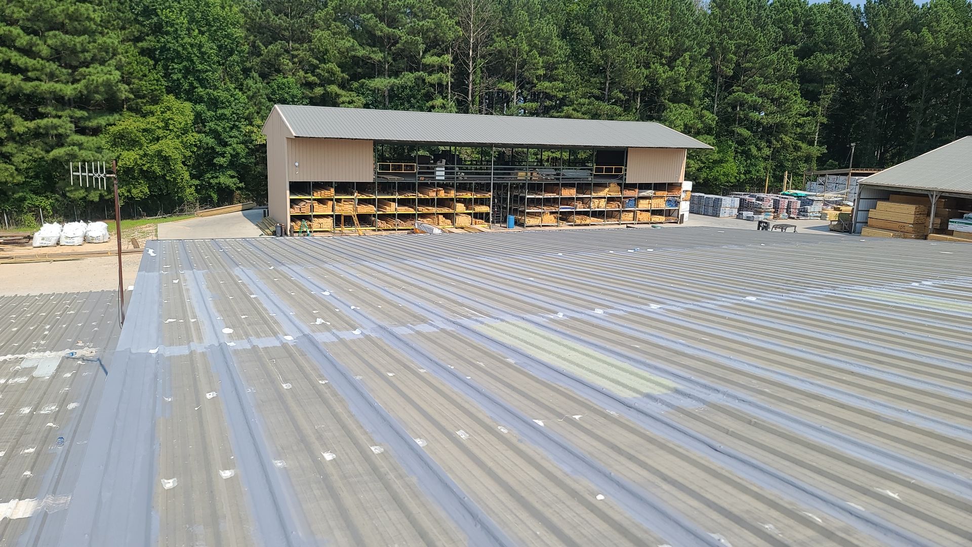 Commercial Roofing Installation using Aldocoat Coatings by Hostetler Roofing