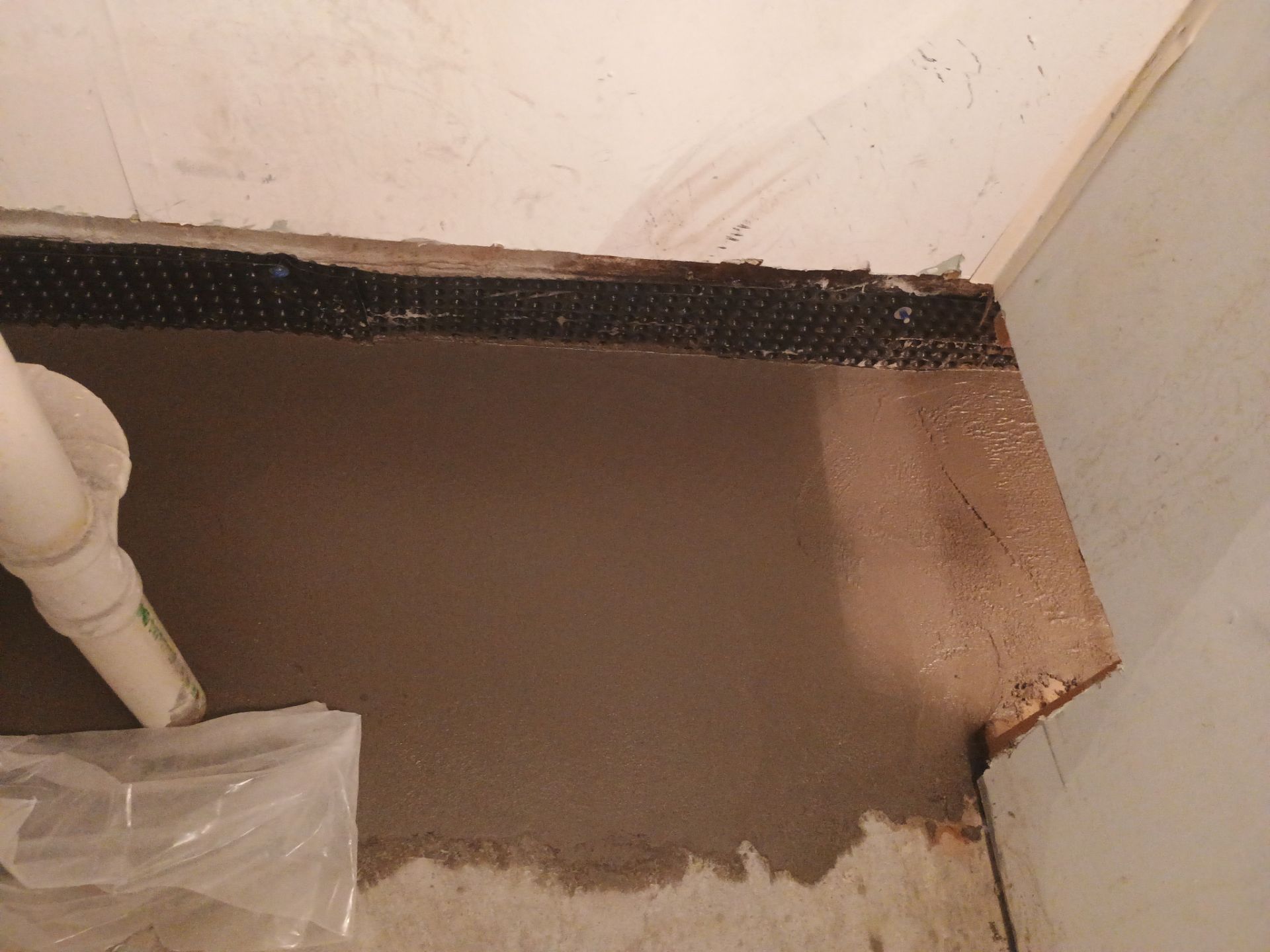 Interior Drain Tile Installation in South Minneapolis by Waterproofing Northeast