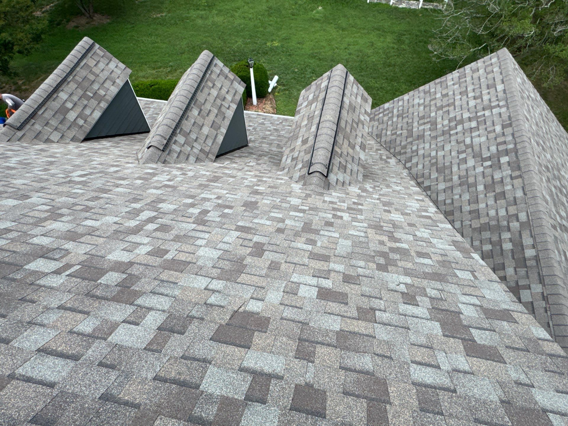 Roof Replacement and White Gutter Installation in Gloucester by Cade Construction