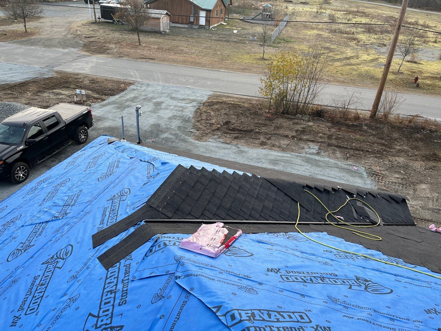 Residential Roofing Installation using OC Oakridge shingles by Top Notch Roofing Inc