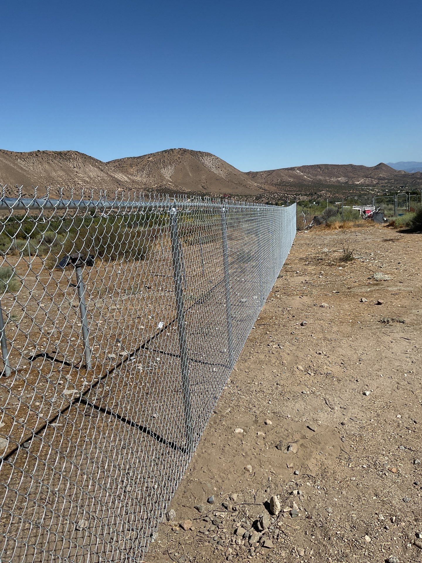 Fence Installation using chain -link by Fence Guys Inc.