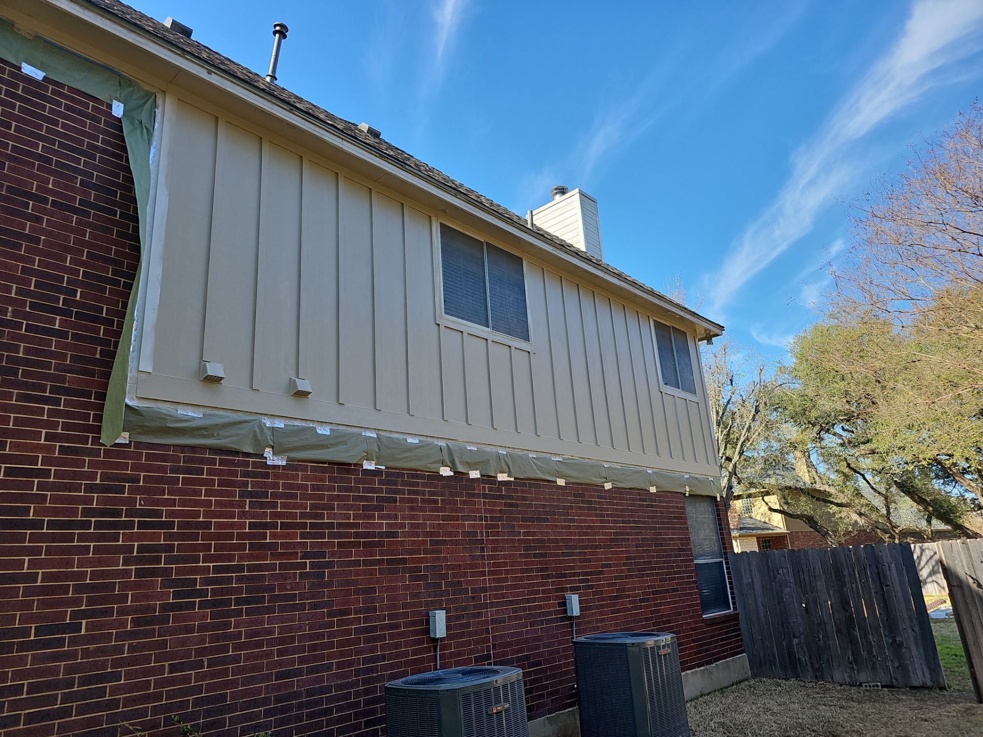 New Hardie Lap Siding & Board and Batten by DeZign Roofing & Exteriors