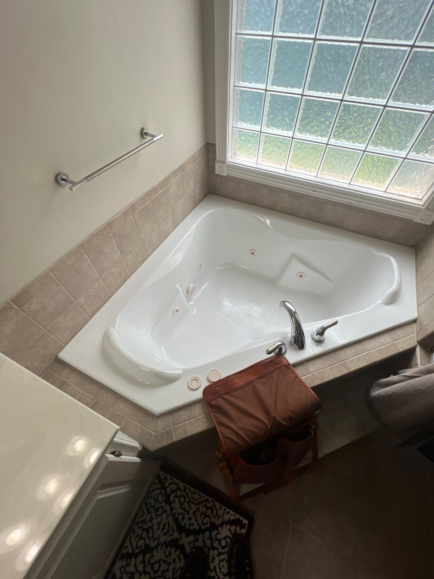 Full bathroom remodel with Artus lighted mirrors, Waltz bathtub and Mercury doors by The Shower Company