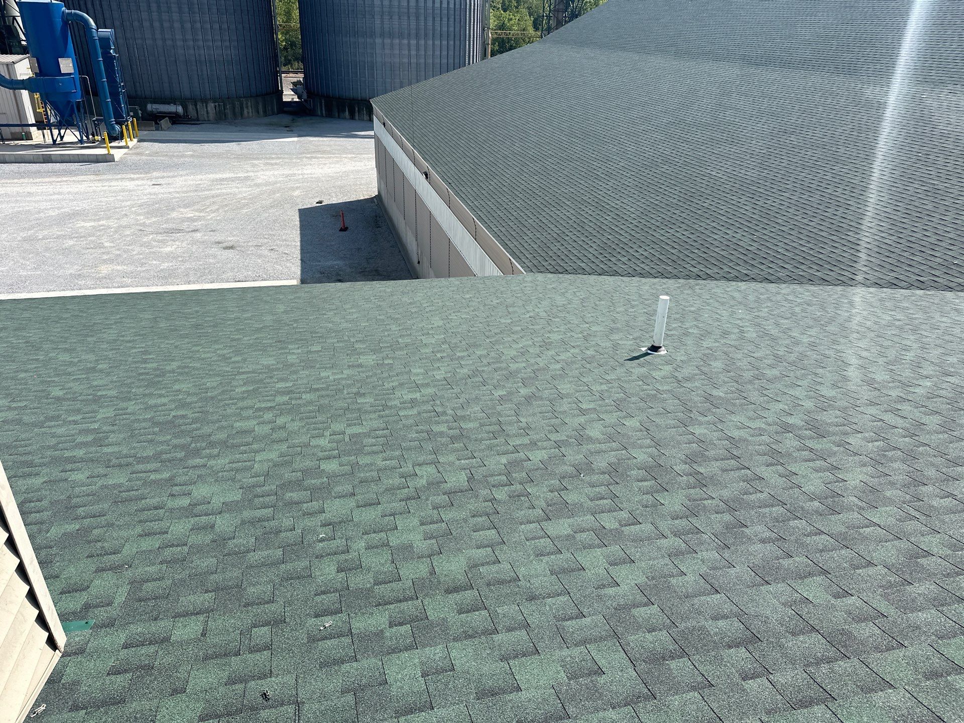 Commercial Roofing Installation using Timberline HDZ Shingles - Hunter Green by RoofX 