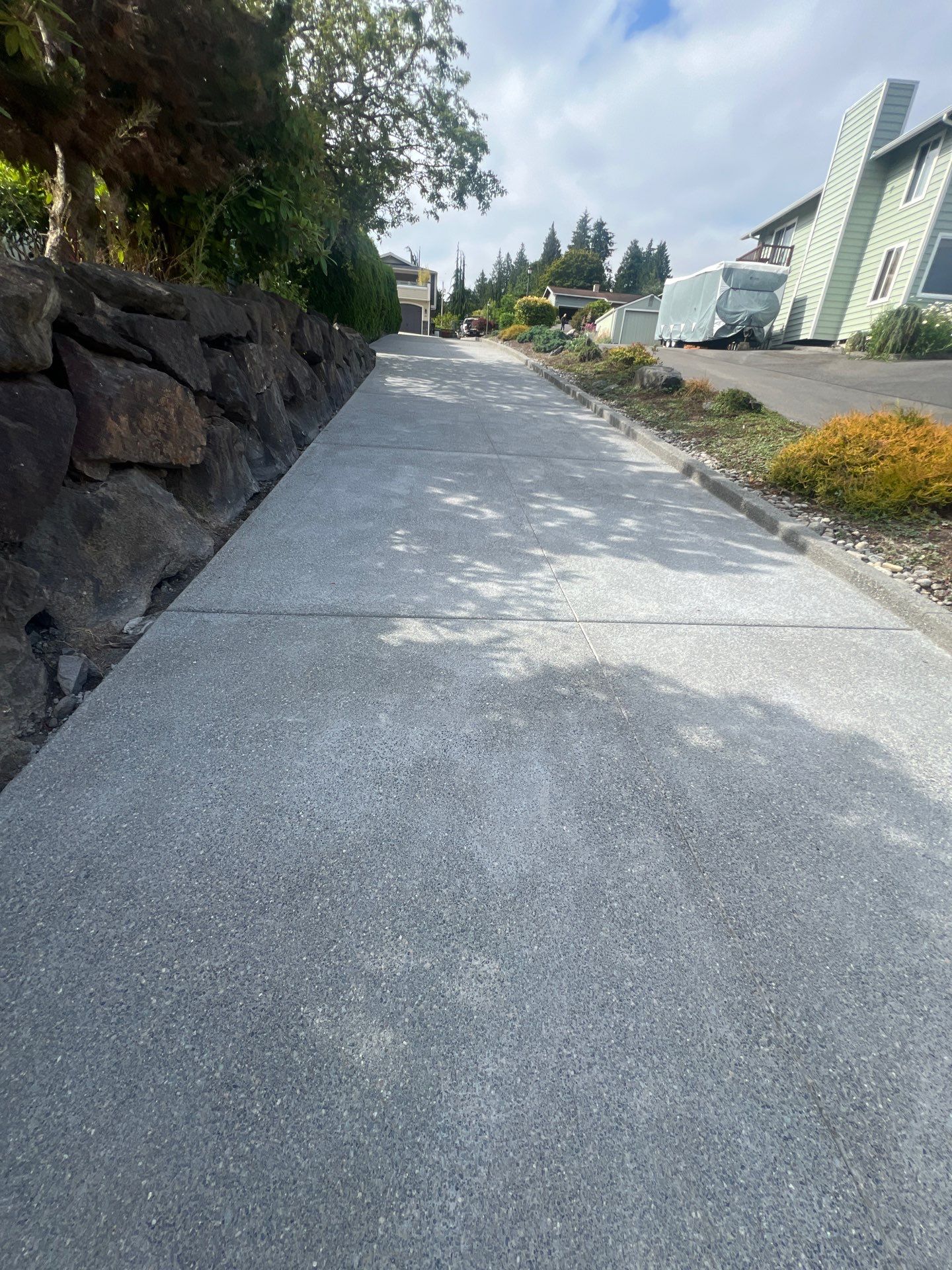 Concrete Driveway Makeover w/ Asphalt Patch | Everett  by Jireh Asphalt & Concrete Inc 