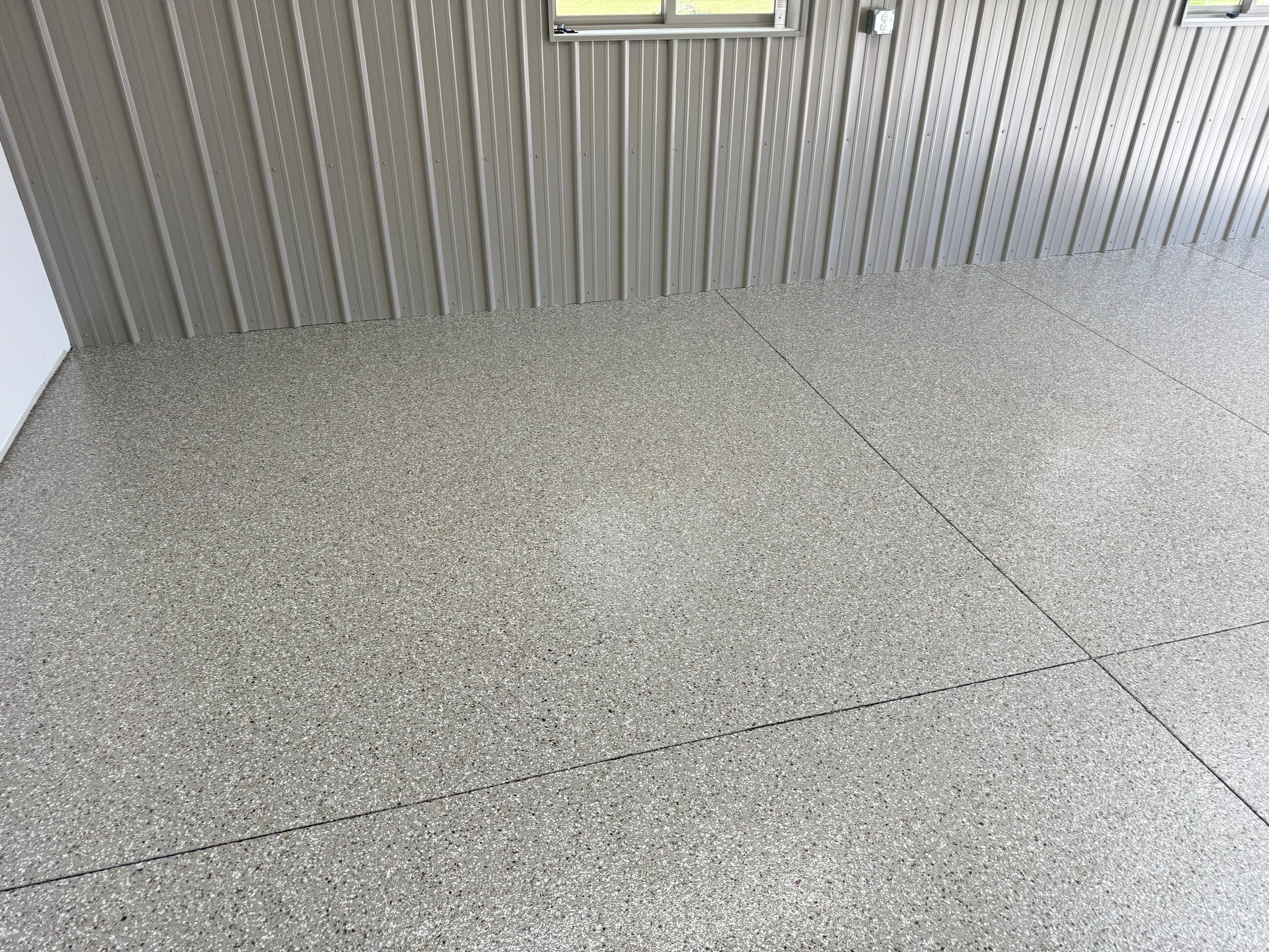 Creekbed Flake Coating in Woonsocket, SD by Select Painting, Coatings & Garage Cabinets