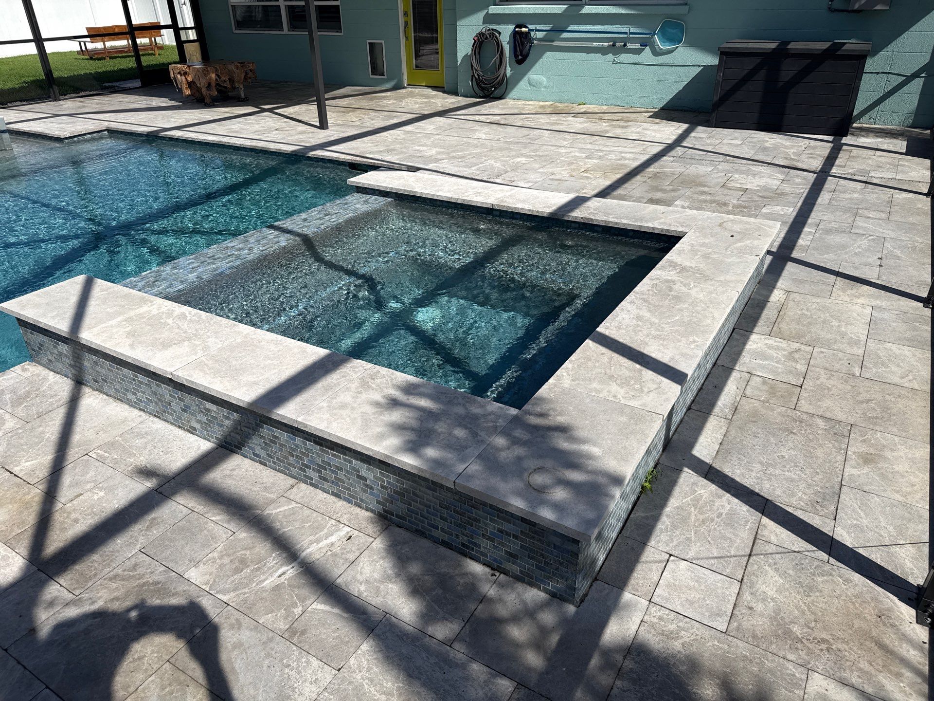Travertine Pool Deck, Lanai & Screen Enclosure Cleaning Near Manatee River | Bradenton, FL by Sunshine AquaWash
