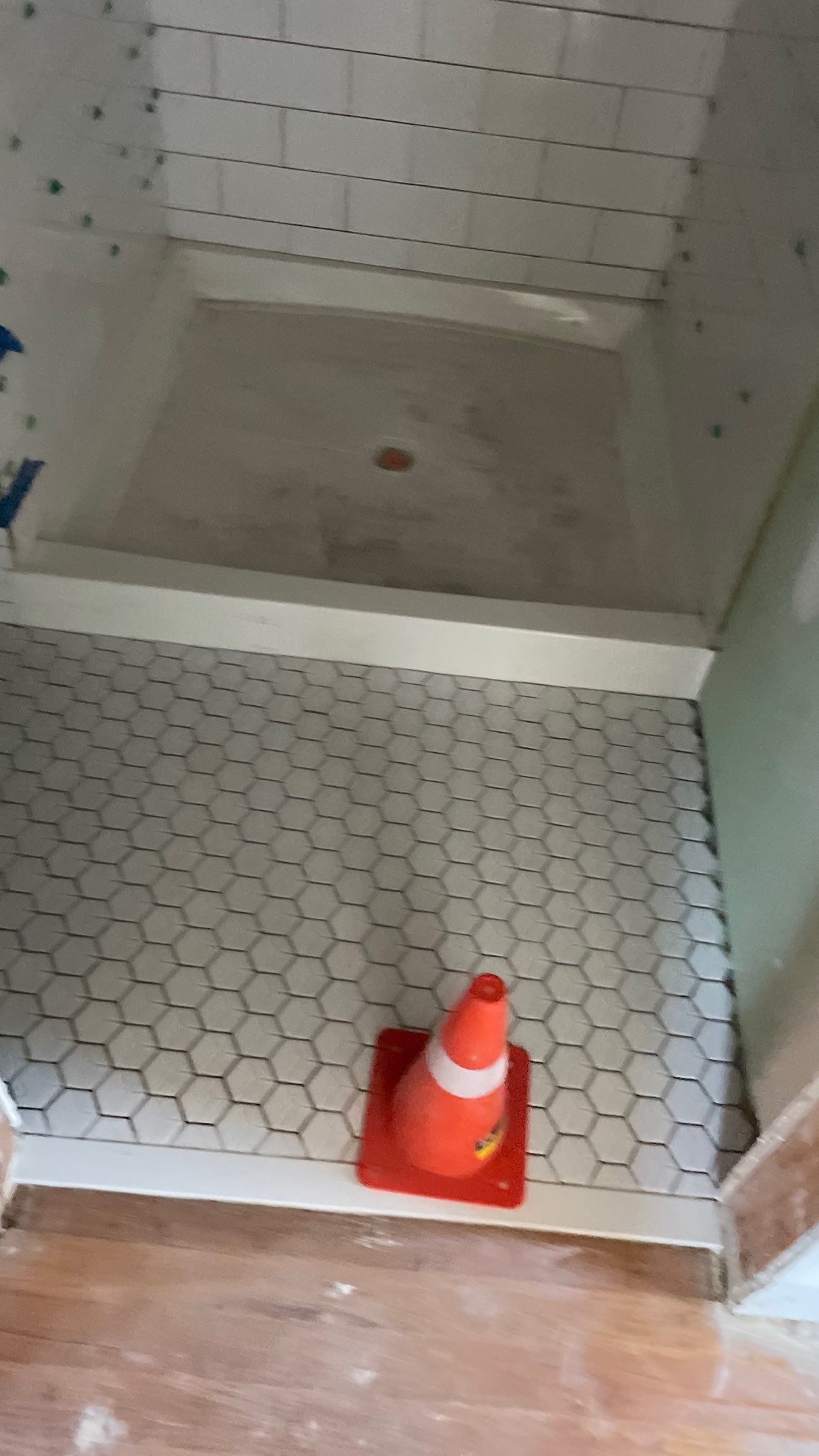 Remodeled Home with new tile floors, Showers and Refinished Oak Floors with stain and Waterbased Finish by Footprints Floors of Coastal Carolina