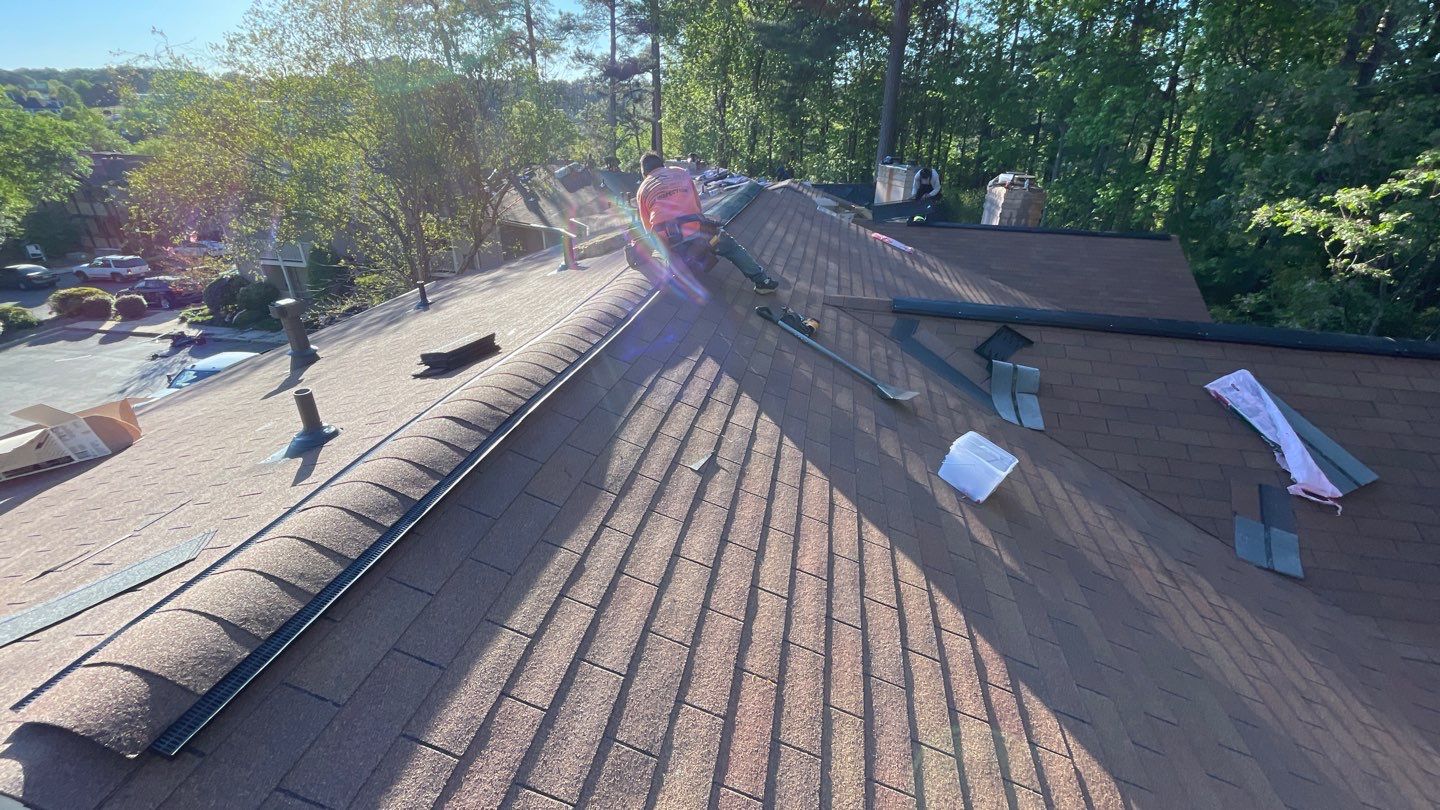 Commercial Roofing Installation using Owens Corning Autumn Brown by Inspector Roofing and Restoration