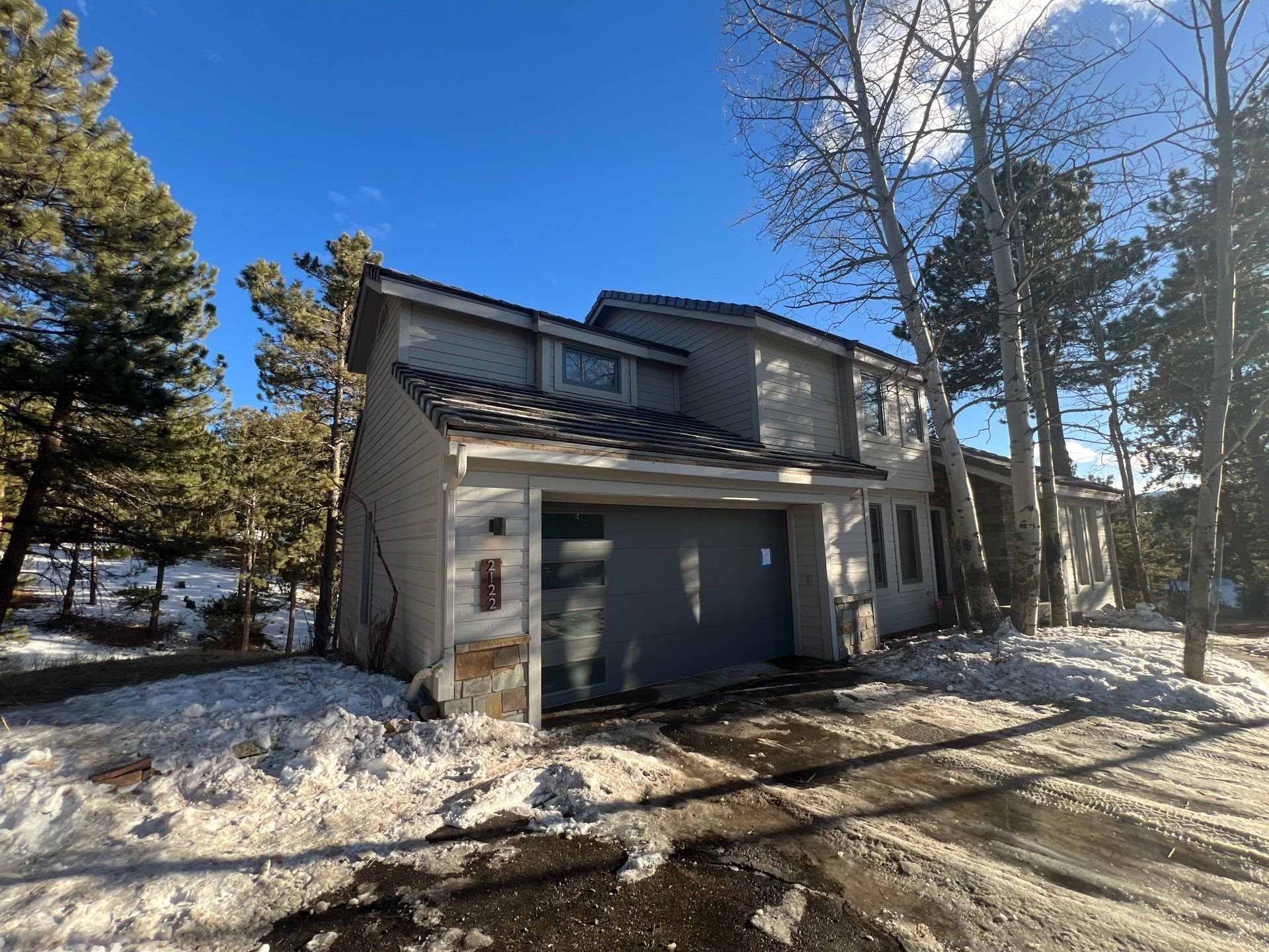 Residential Roofing Installation using Concrete Tile by Blue Peaks Roofing LLC 
