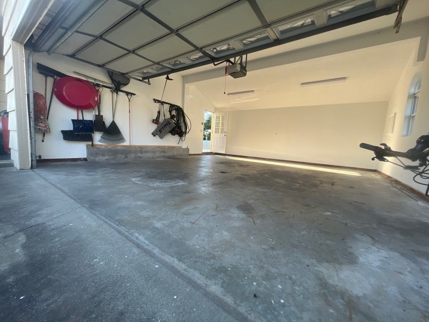 Garage in Shrewsbury, MA 01545 by Symphony Concrete Coatings