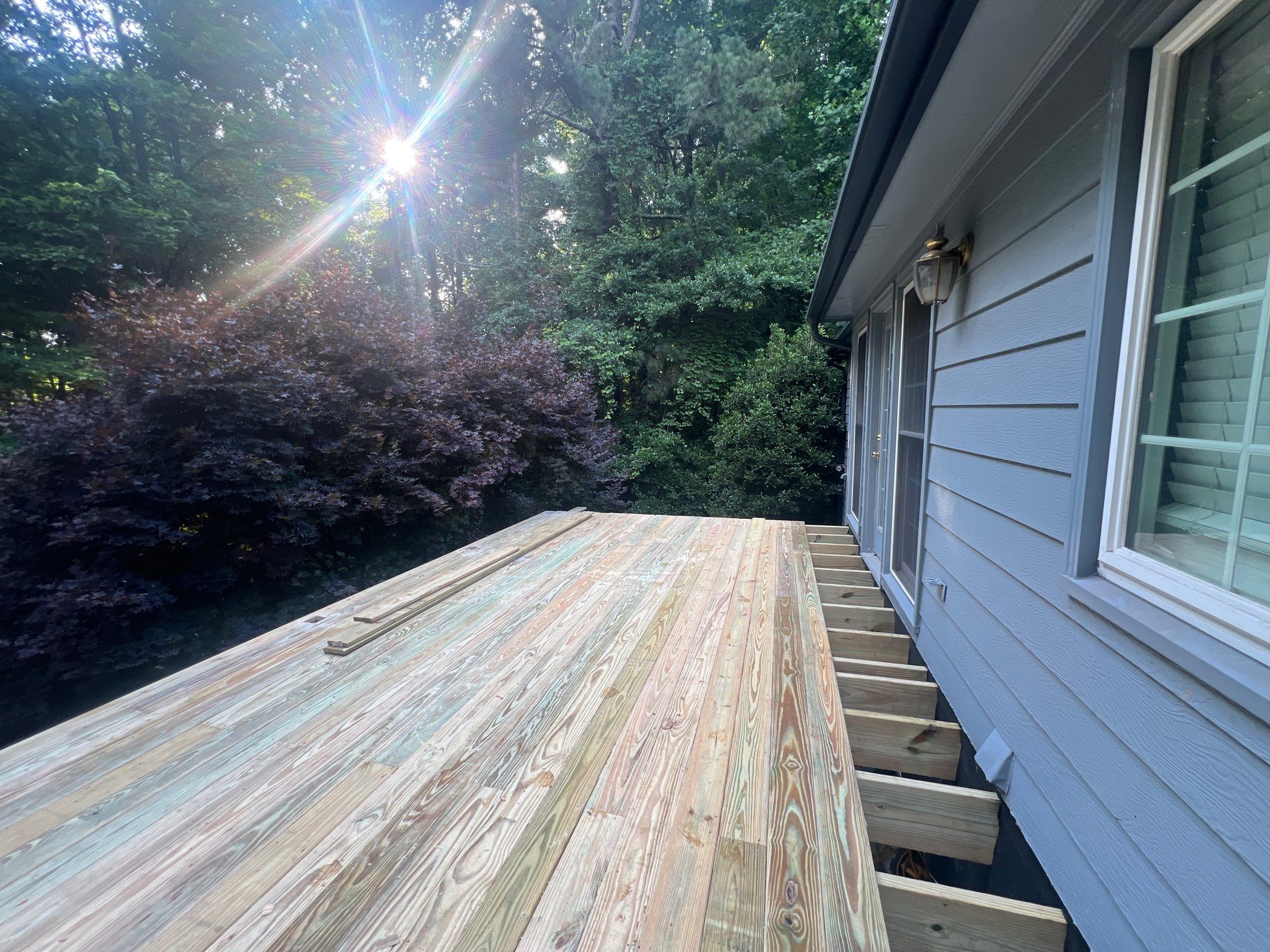 Pressure-Treated Wood Deck Replacement and Staircase Installation in Kennesaw by Swift Home Renovations