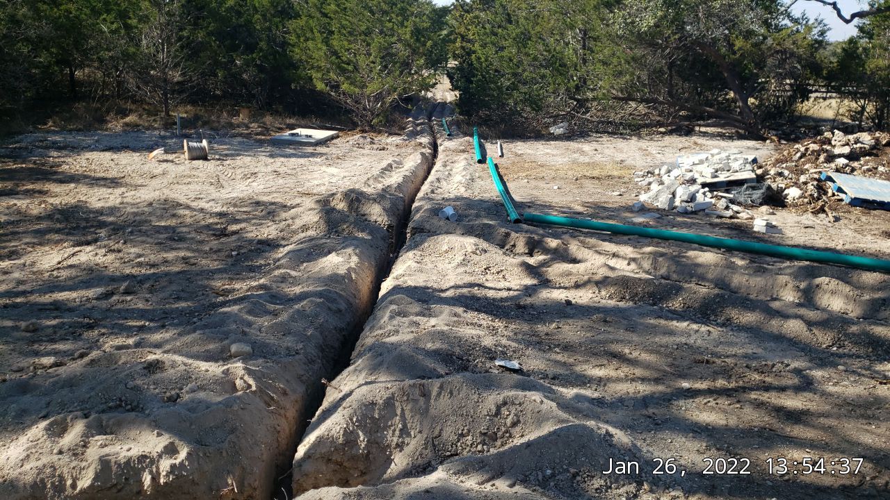 30K gallon mangrove green tank for residential rain water harvesting, Dripping Springs, TX by Hill Country Rain Water