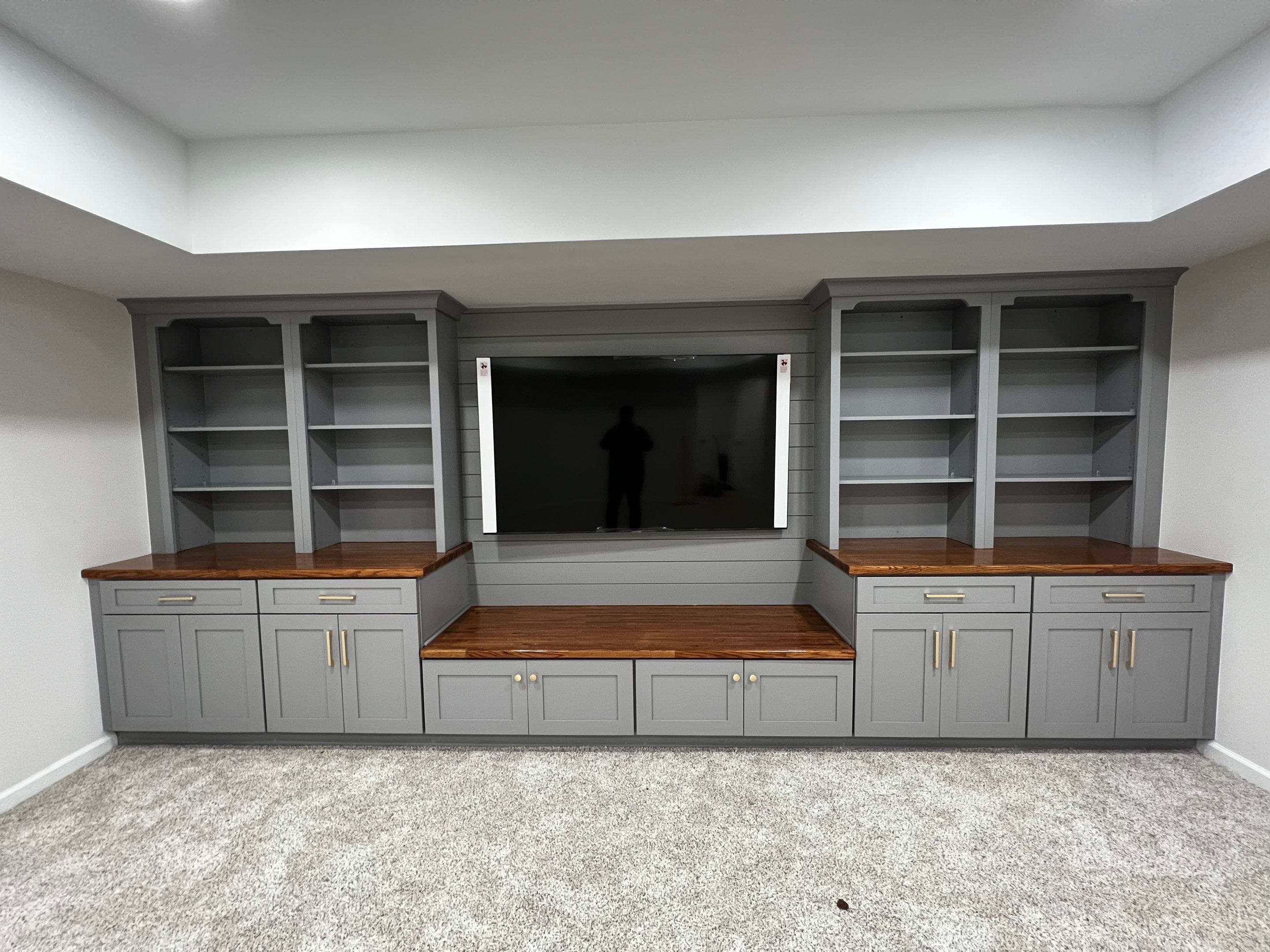 Finished Basement with Custom Built-ins and Full Bathroom in Acworth by Swift Home Renovations