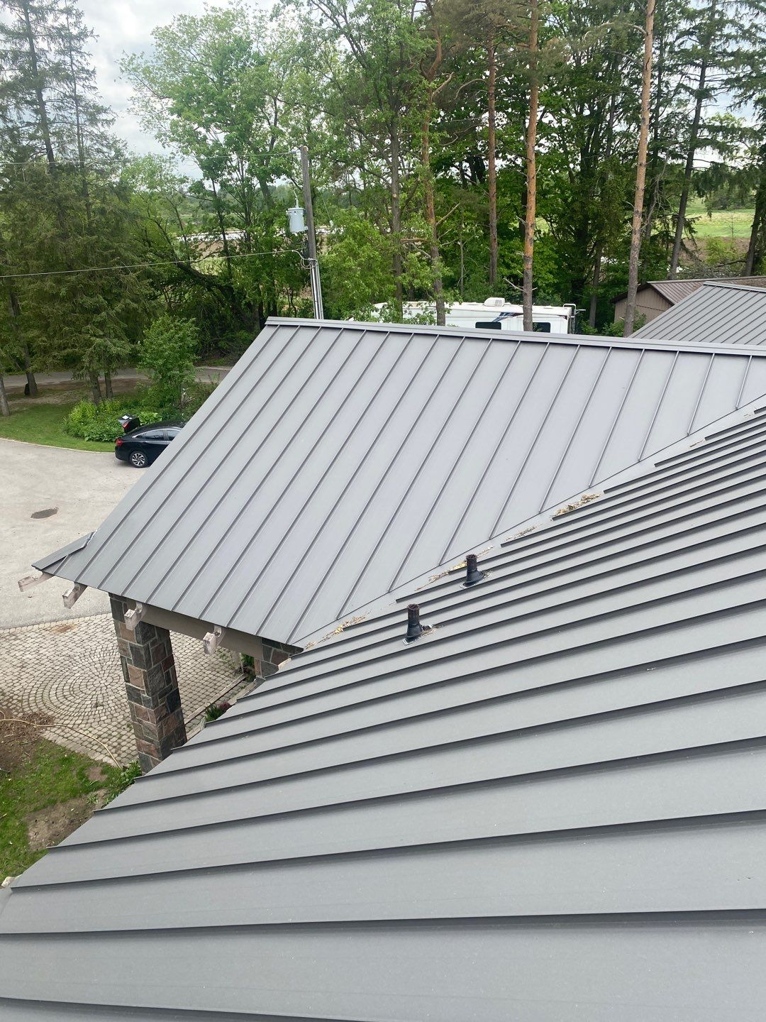 New Roof Installation using 16" Standing Seam Panels by Jay Carter Roofing & Sheet Metal