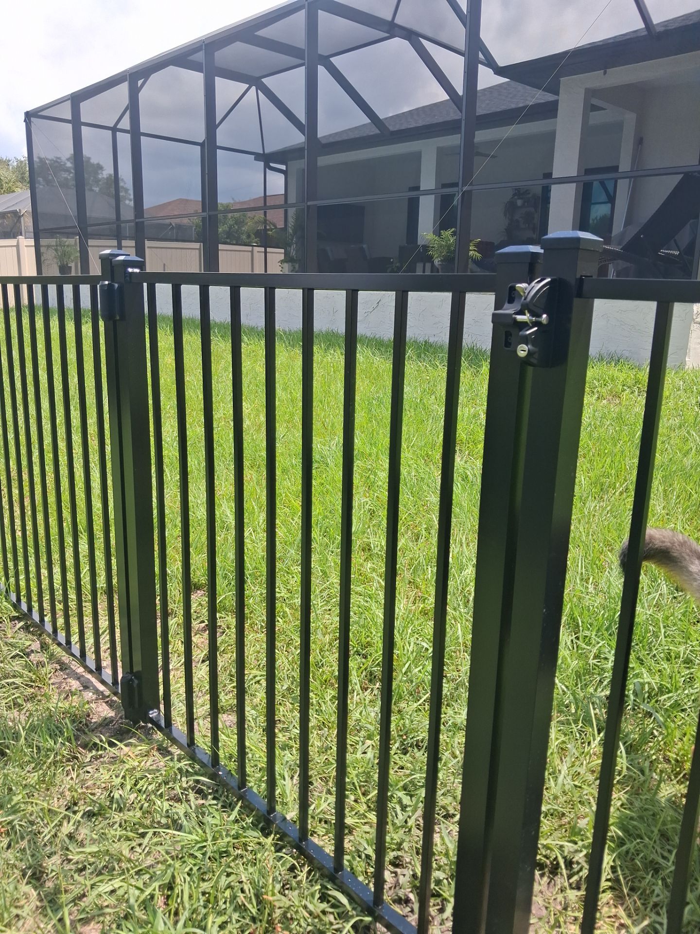 Vinyl Privacy Fencing and Aluminum Pool Security Installation in Port Charlotte by True Fence LLC