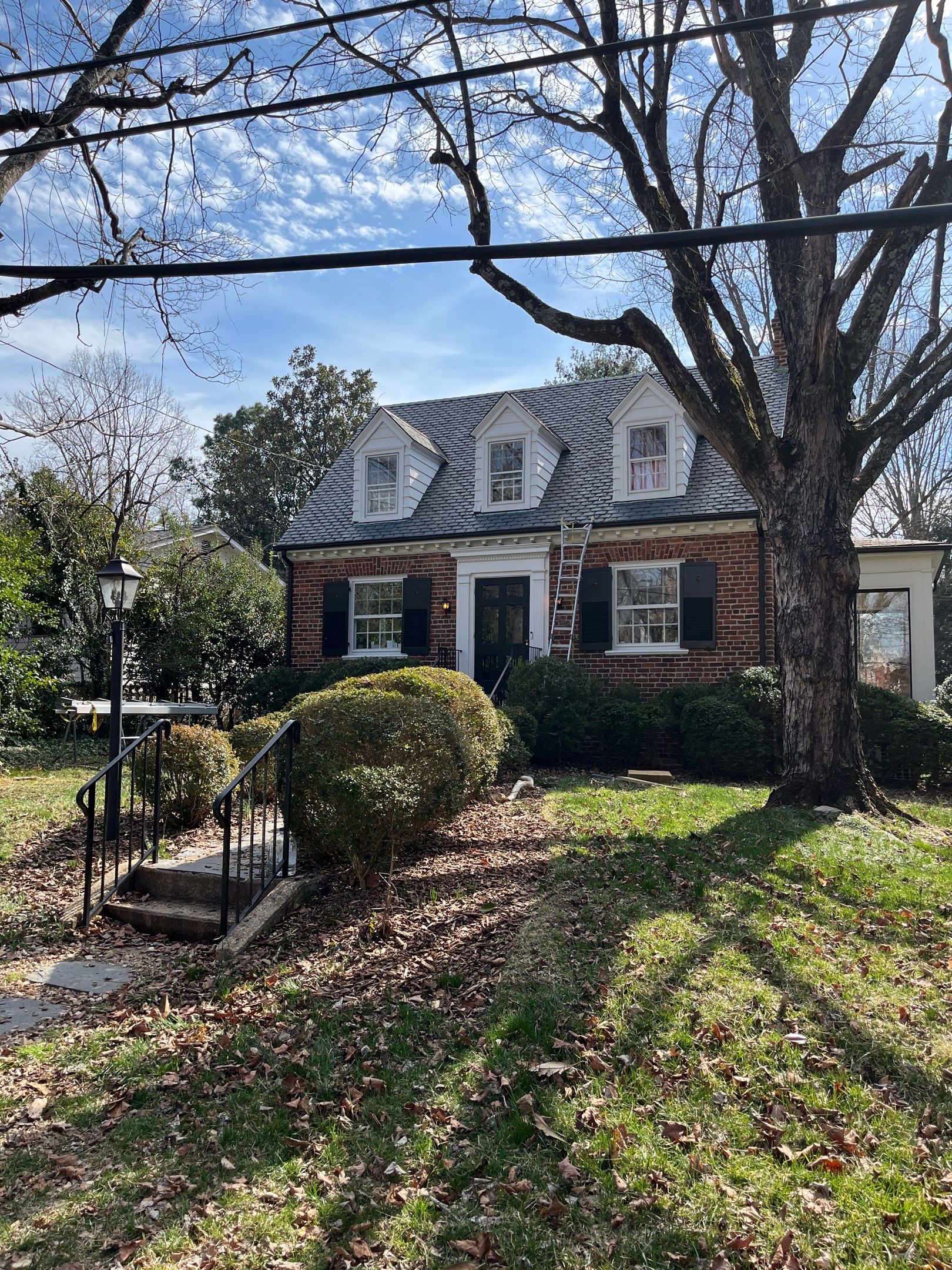 Slate Roof Restoration and Copper Ridge Cap Install in Richmond by Cade Construction