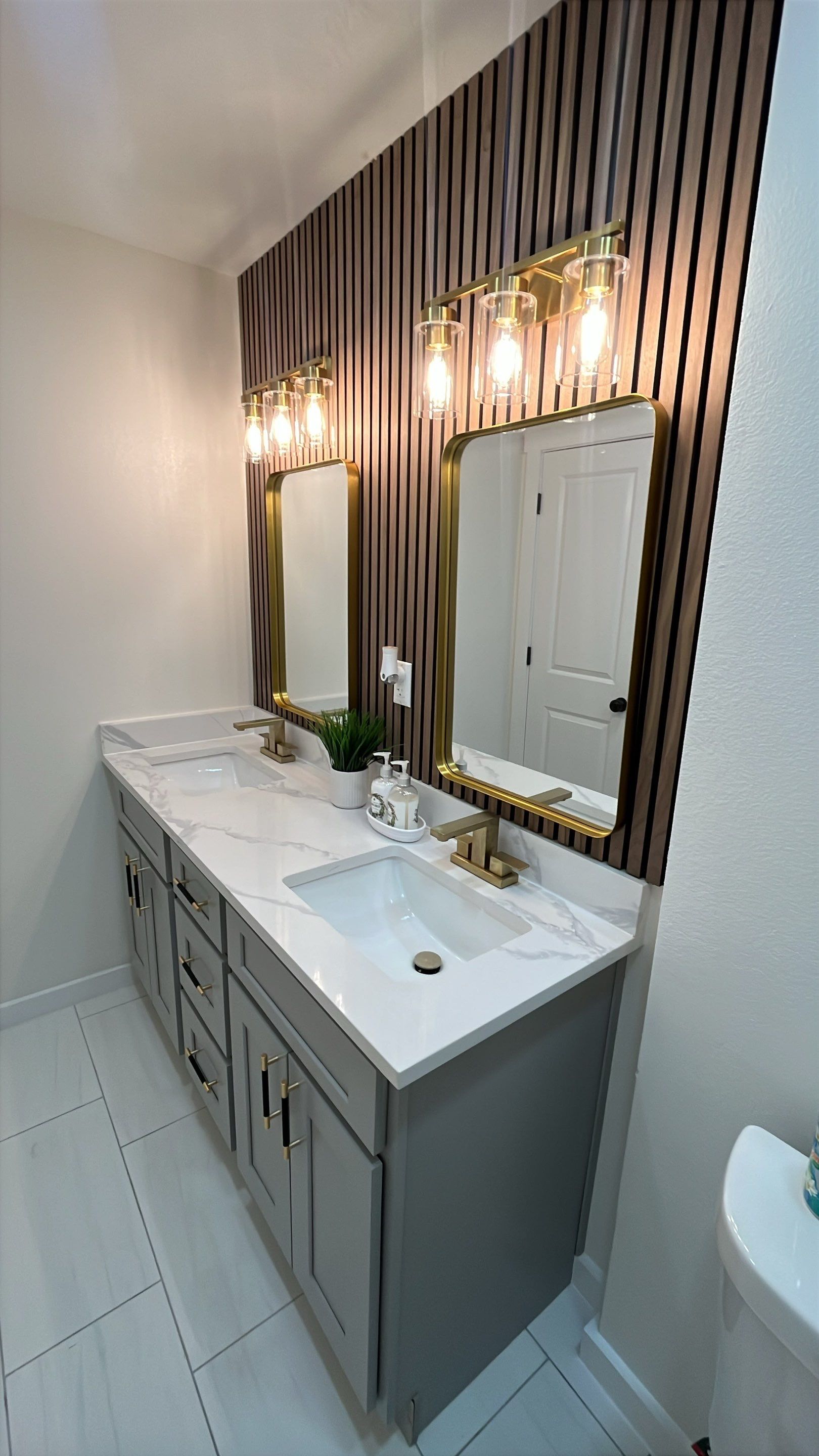 Houston Bathroom Renovation Featuring Custom Wood Slats by Rolling Nations
