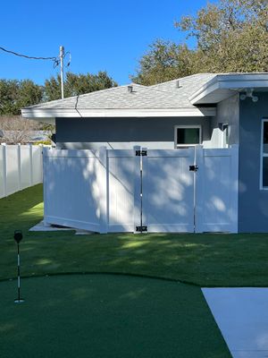 Vinyl Privacy Fence With AC Enclosure and Storage Corral