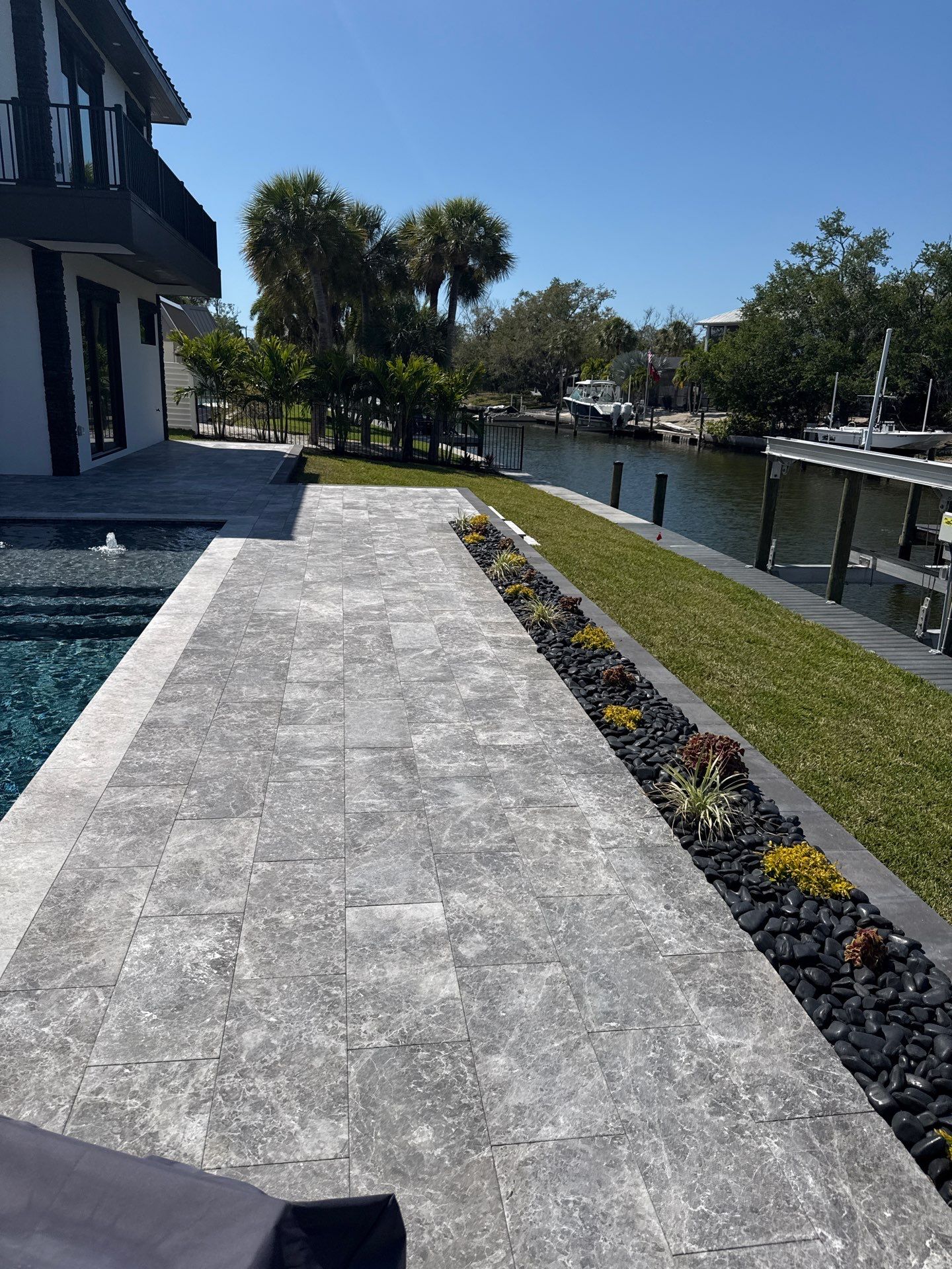 7-Inch Smooth Box Seamless Gutters using black seamless gutters in Siesta Key Fl by Gutter Professors