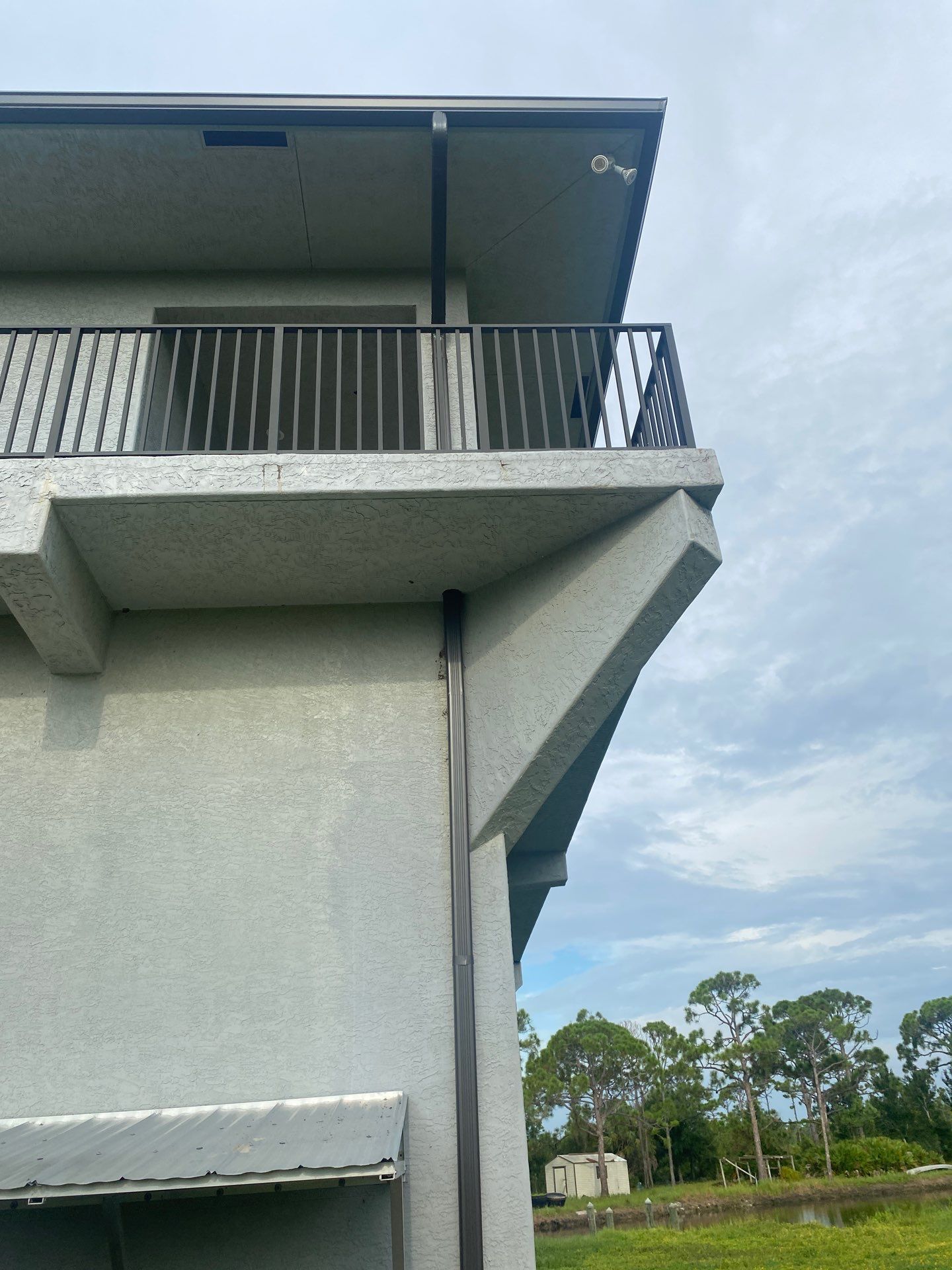 Black Seamless Gutters St. James City by Gutter Professors