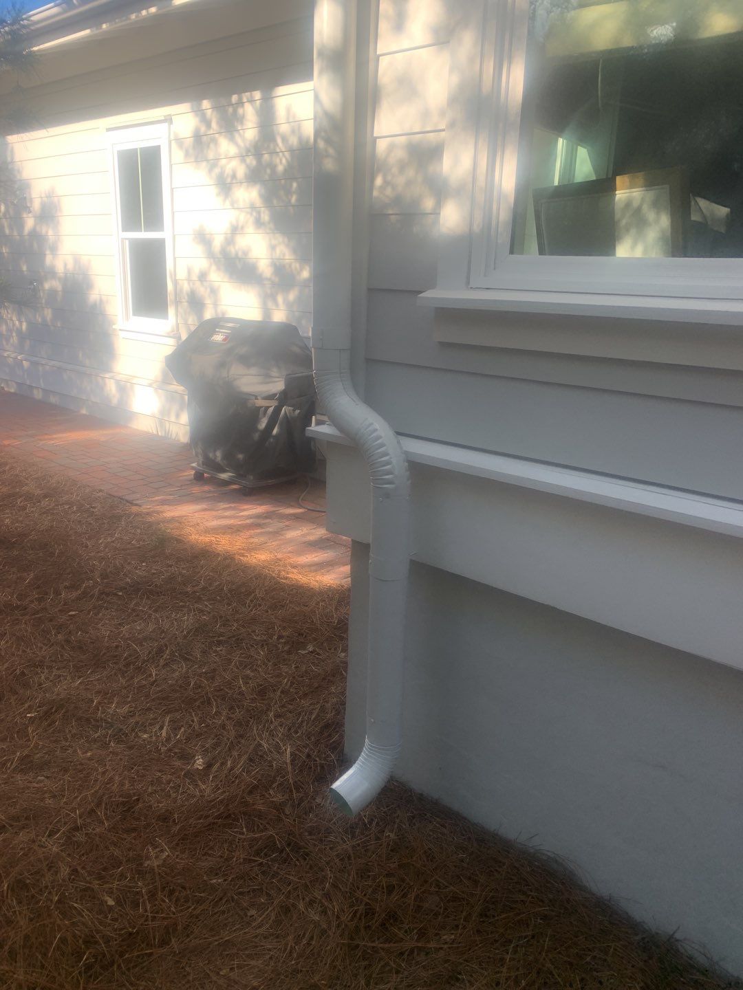White Half-Round Gutters Installation in Rosemary Beach, FL  by Gutter Professors