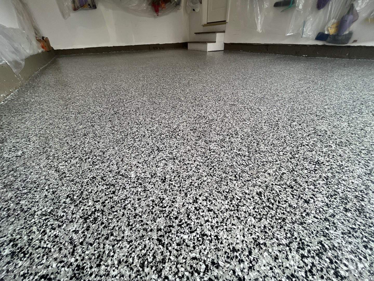 Garage in Peabody, MA 01960 by Symphony Concrete Coatings