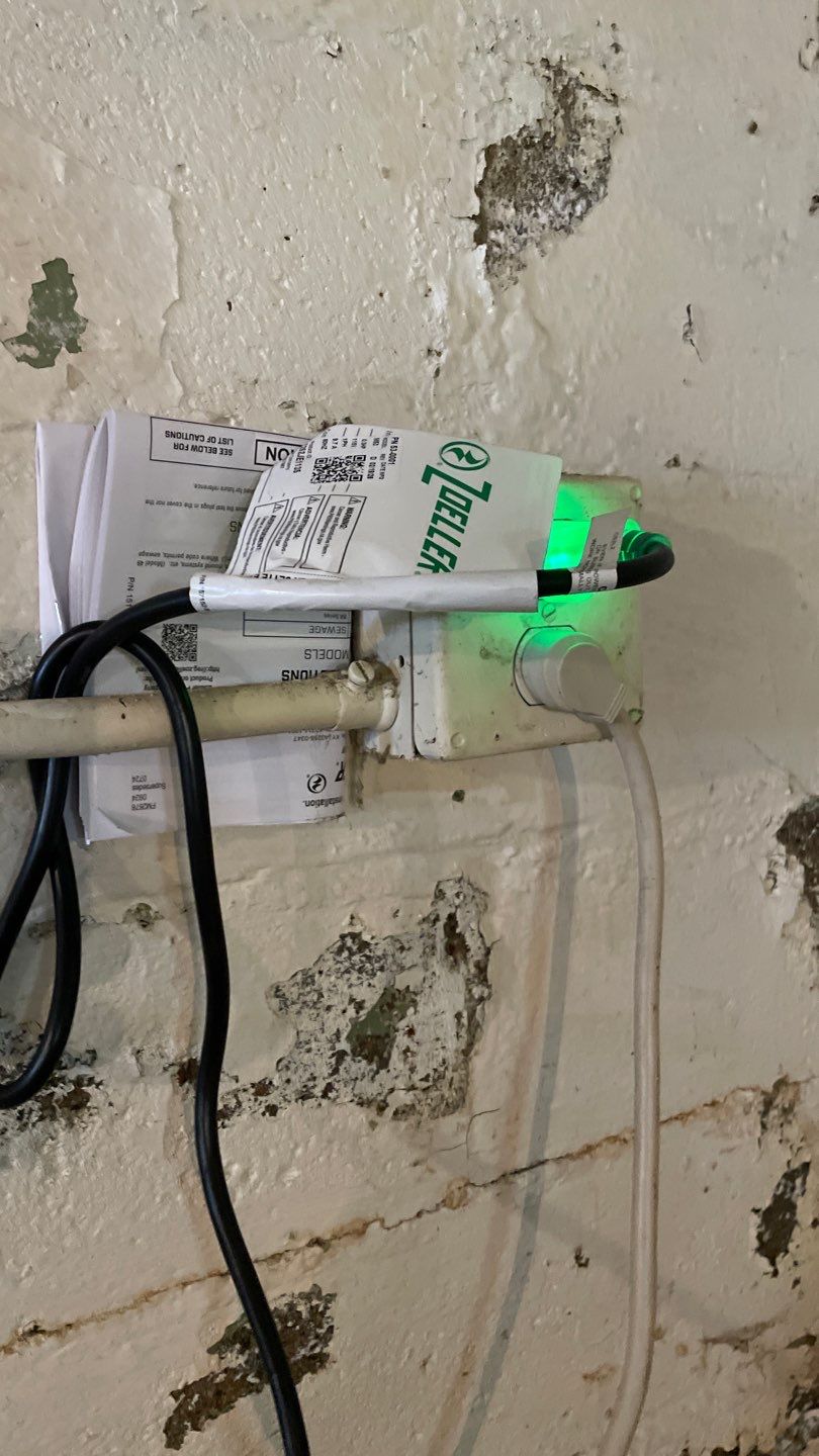 Interior Drain Tile & Sump Pump System in North Minneapolis by Waterproofing Northeast