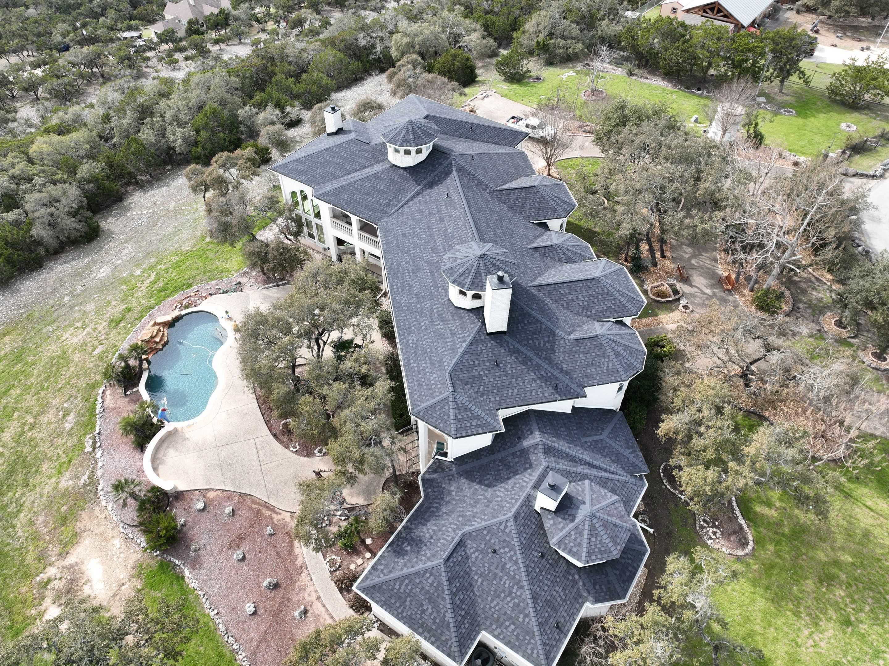 Residential Roof Replacement using 30 Year Laminate Shingles with High Profile Ridge by Premier Roofing and Contracting