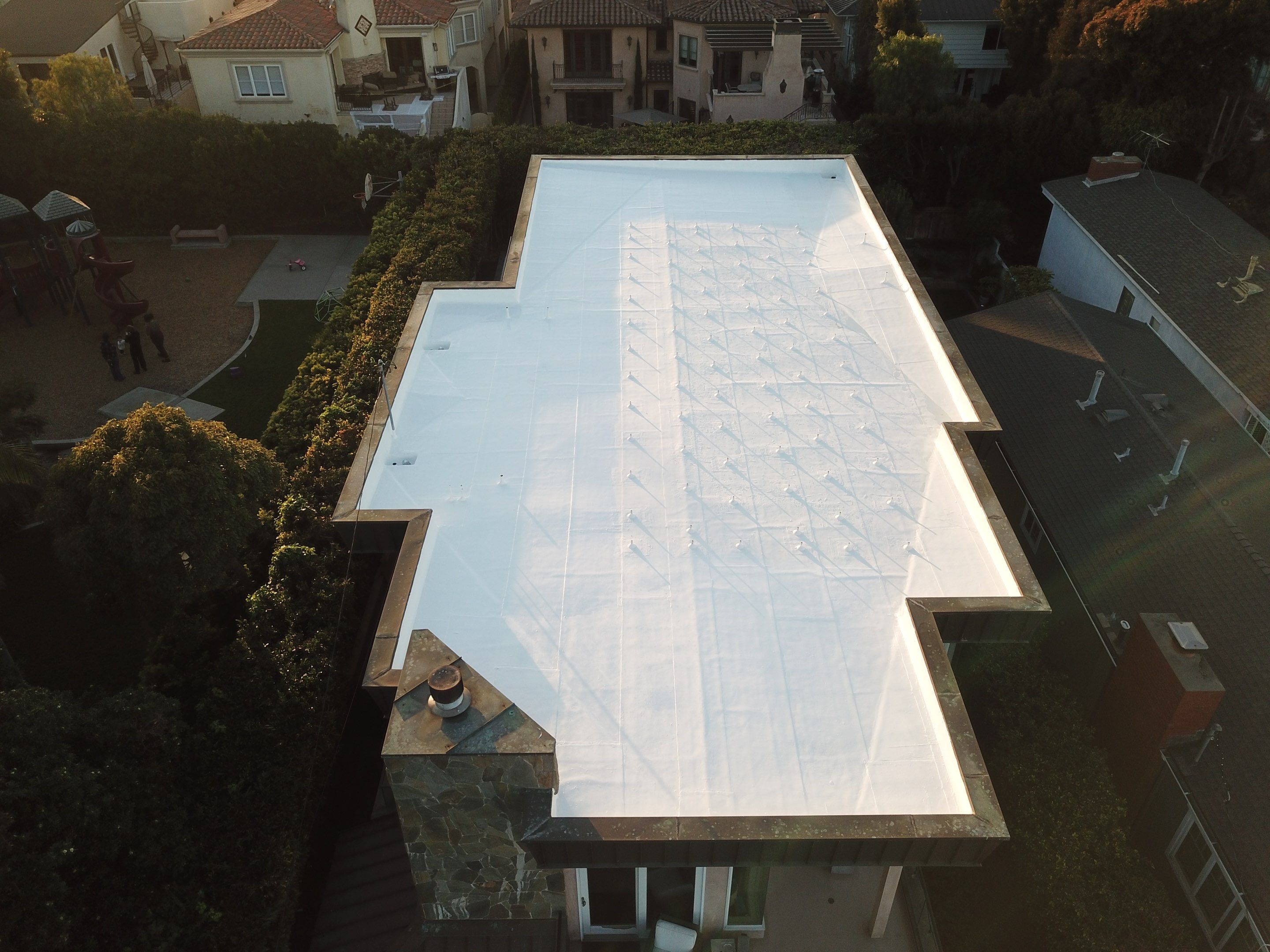 Residential Roofing Installation using ASC Silicone Membrane by Hull Brothers Roofing