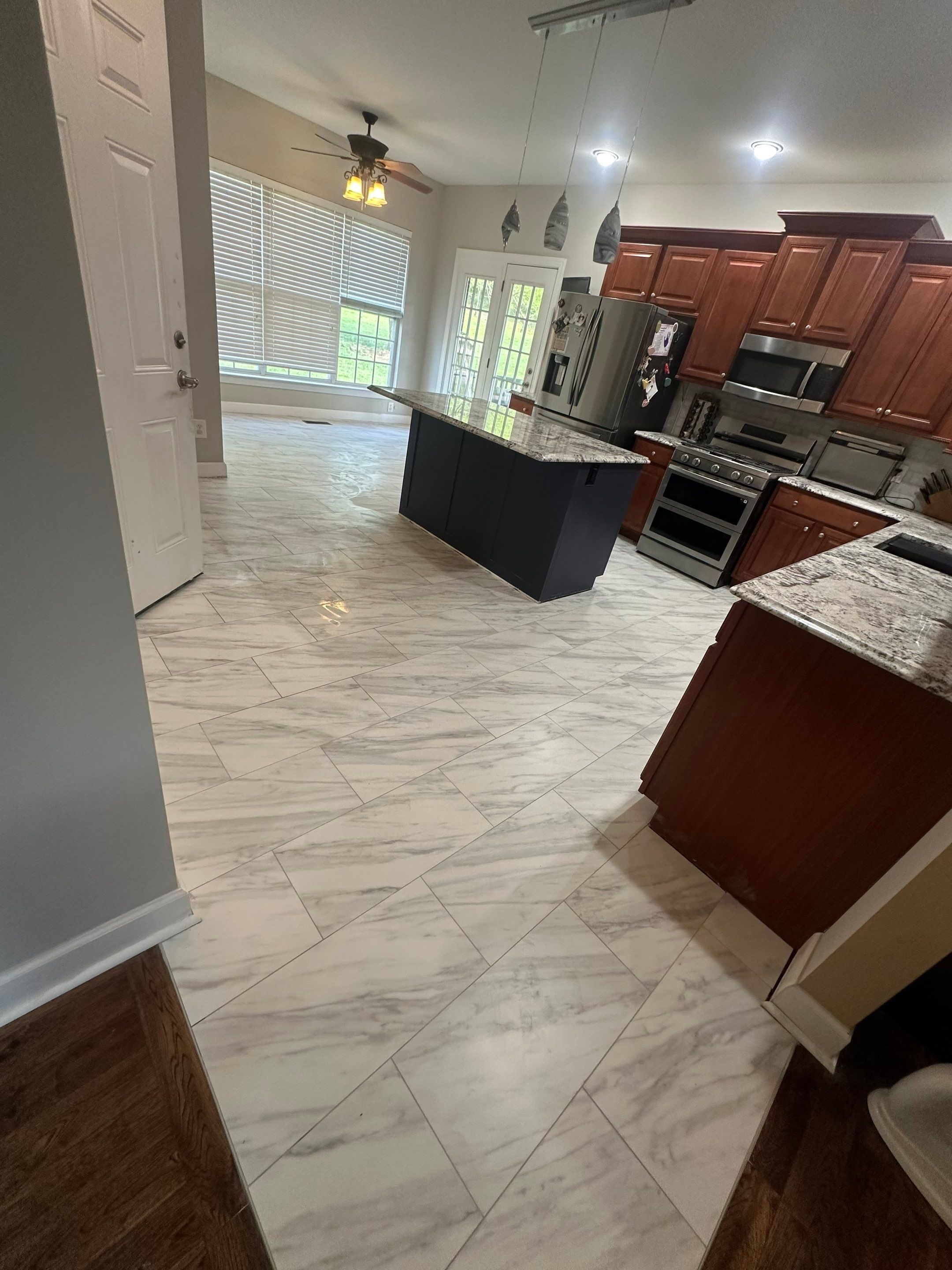 Kitchen floor refresh  by Footprints Floors of Nashville