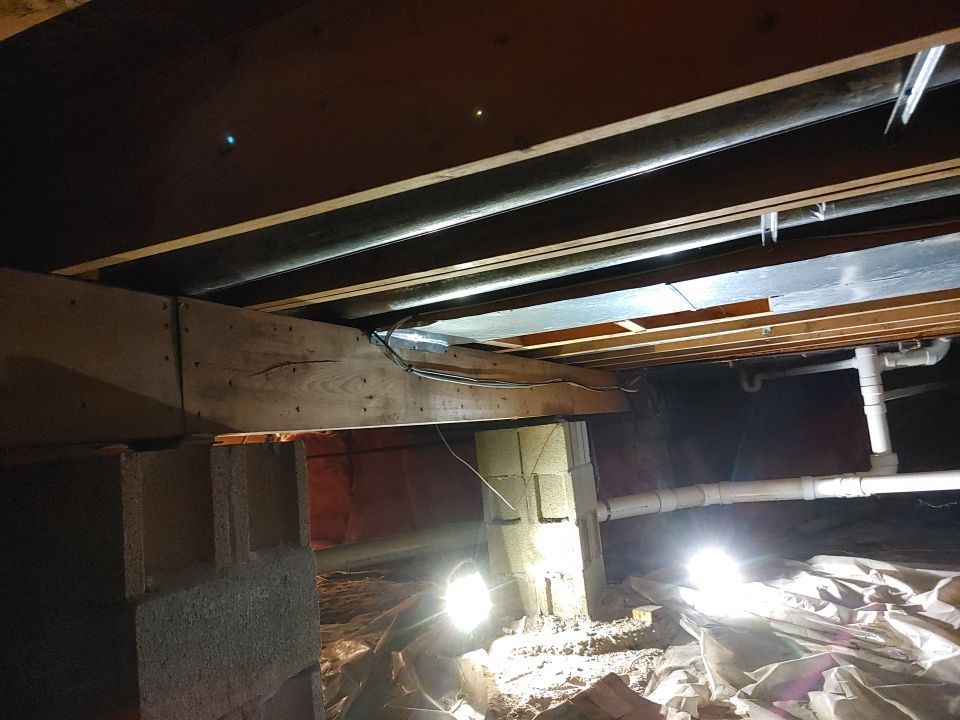 Crawl space encapsulation and Waterproofing using Structural Wood and Steel Reinforcements by Toledo Basement Repair 