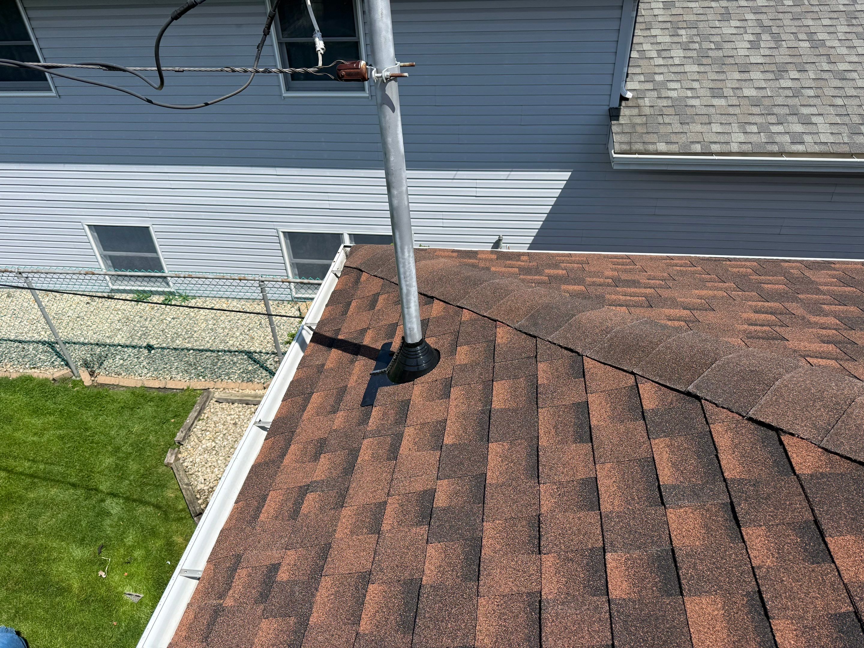House and garage roof replacement by Optimal Home Improvement 