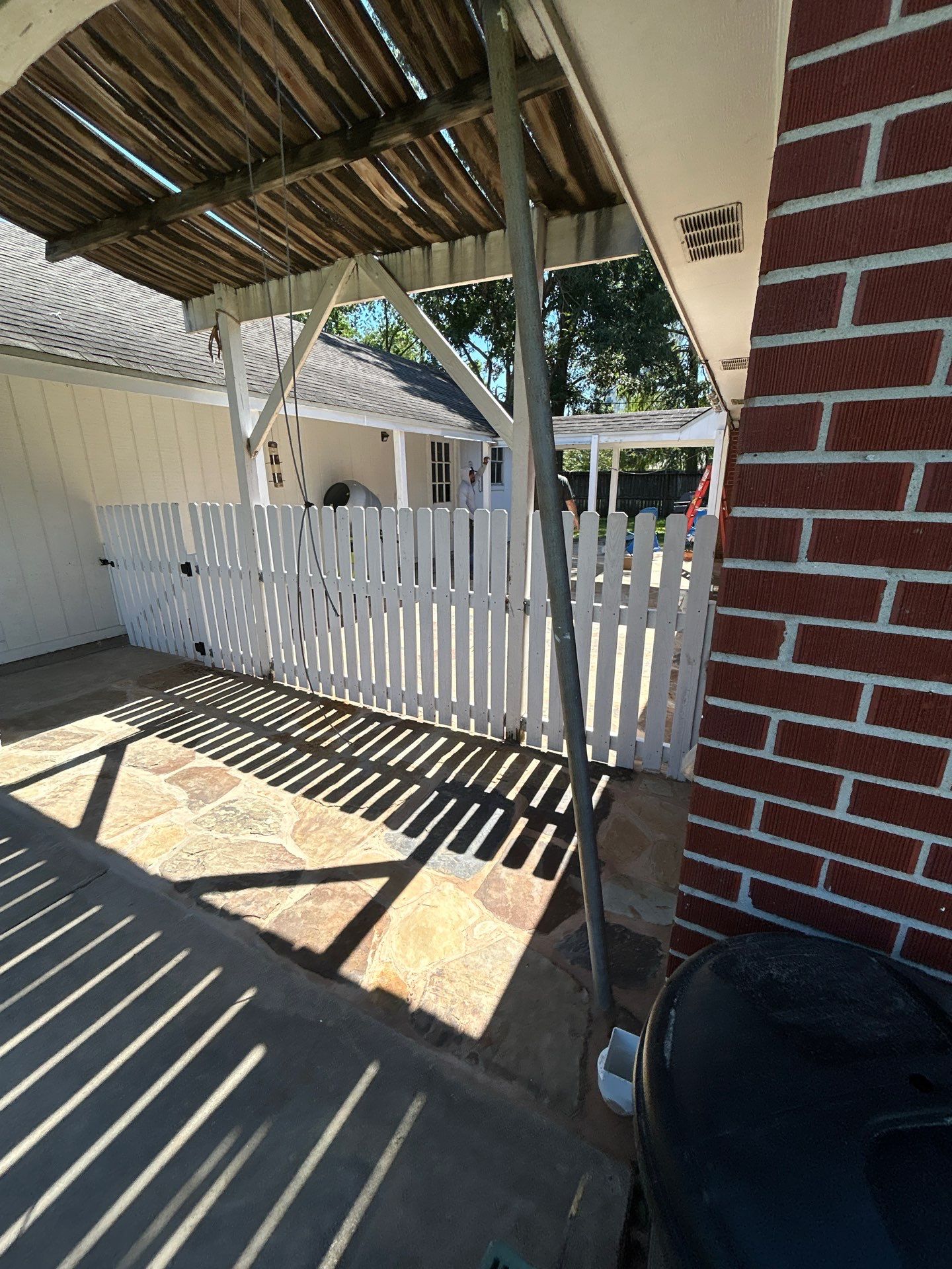 🌿 Rodney – Full Gutters, Drainage System, Flagstone Patio & Pergola  Alejandro and the Texas Urban Elements Team recently completed a multi-solution project for Rodney’s home, blending function with design.  ✅ Seamless Gutters We installed a complete 6” seamless gutter system around the home to properly redirect rainwater away from the foundation, protecting siding, paint, and landscaping while boosting curb appeal.  ✅ Drainage System A new PVC storm drainage system was integrated into the gutters and extended to carry roof runoff away from the house. This ensures water won’t pool near the foundation or the new patio area.  ✅ Flagstone Patio Ground We prepped, leveled, and installed a custom flagstone patio for Rodney—delivering both beauty and durability, creating a natural, timeless look that ties perfectly into the yard.  ✅ Pergola Addition To conclude, our framing team constructed a small pergola extension, providing Rodney’s patio with a shaded retreat for family and friends to enjoy.  ✨ Result: A fully protected and enhanced outdoor living space where drainage, stonework, and structure all work together for long-lasting performance and comfort.  📢 At Texas Urban Elements, we specialize in building solutions that protect homes while creating beautiful outdoor environments. by Texas Urban Elements