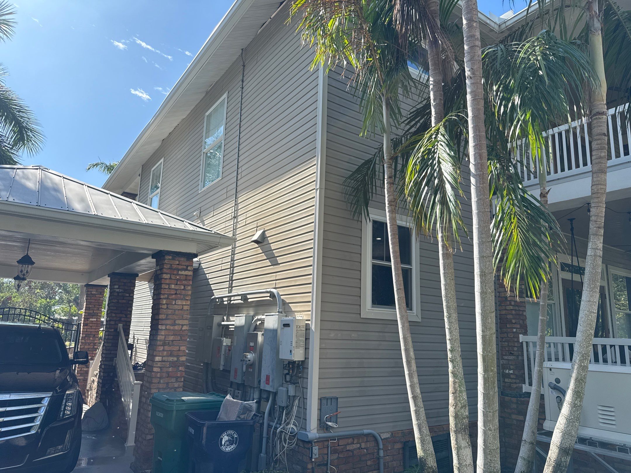 2-Story House Wash and Garage Pressure Washing in Palmetto, FL by Sunshine AquaWash