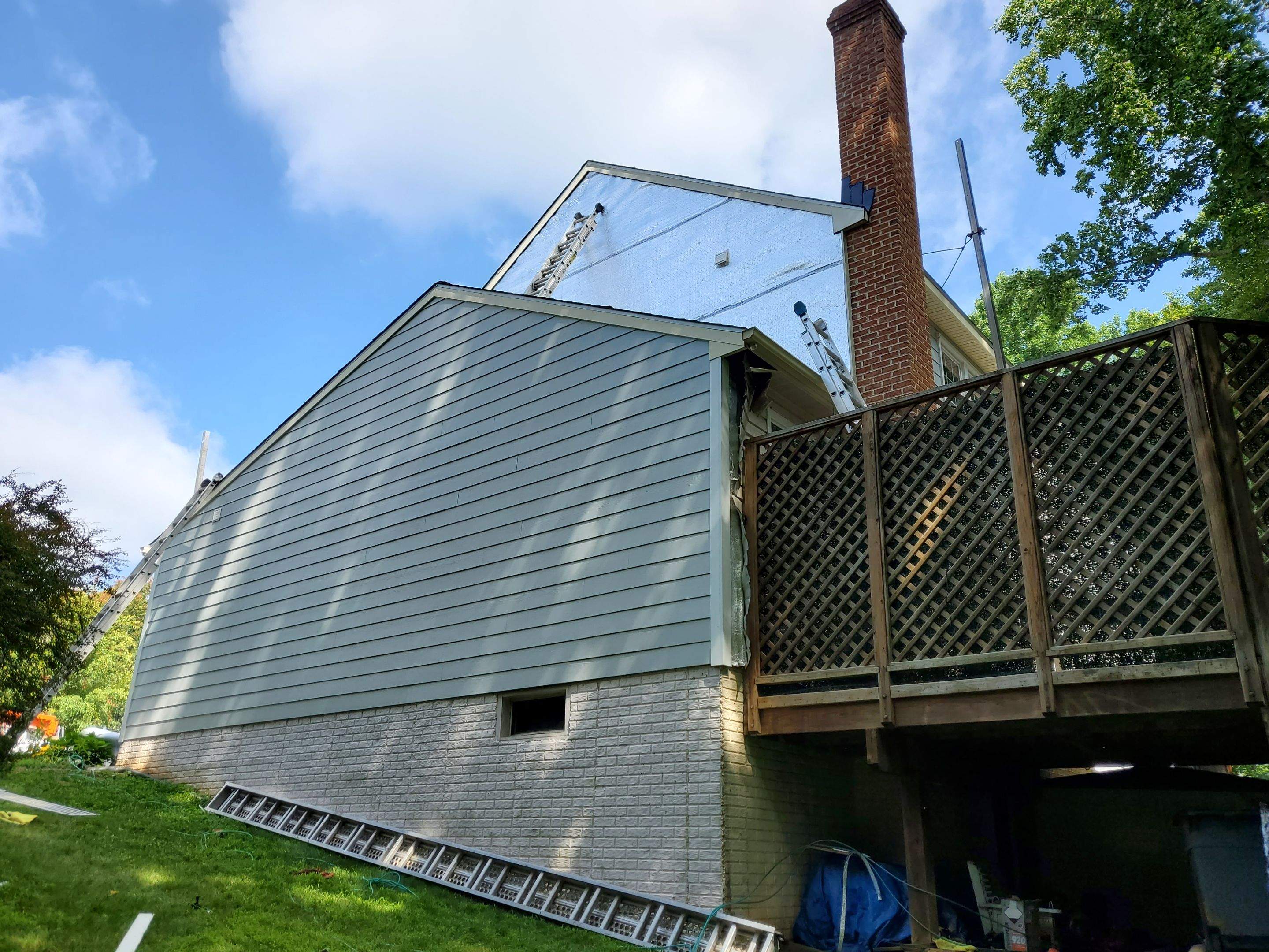 Exterior Home Makeover using GAF Timberline HDZ, GAF Decotech, and James Hardie Siding by American Home Contractors