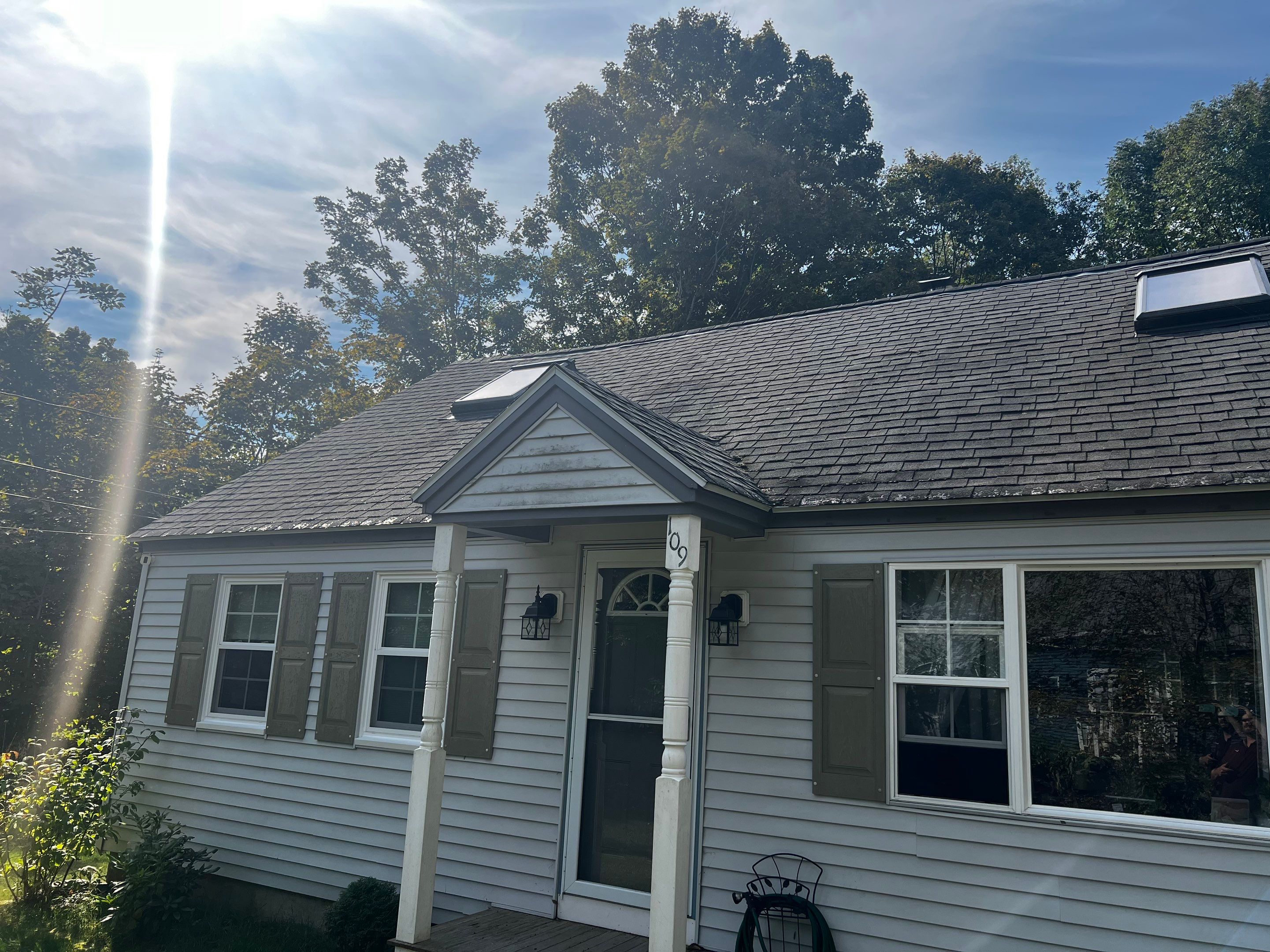 Complete Exterior Renovation Featuring Owens Corning Shingles and Vinyl Siding by Tall pine roofing