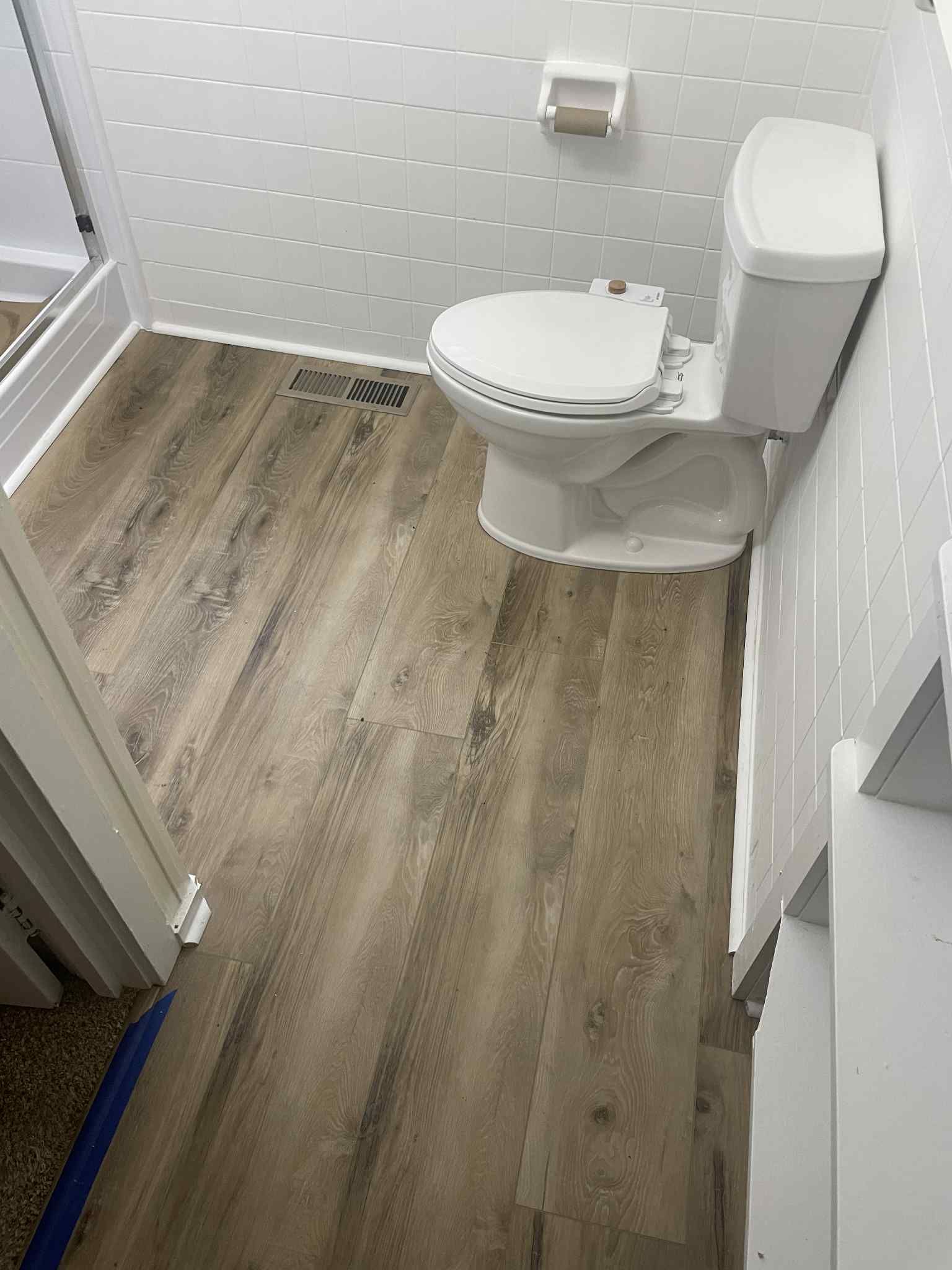 Bathroom Floor Installation by Axtra Hand