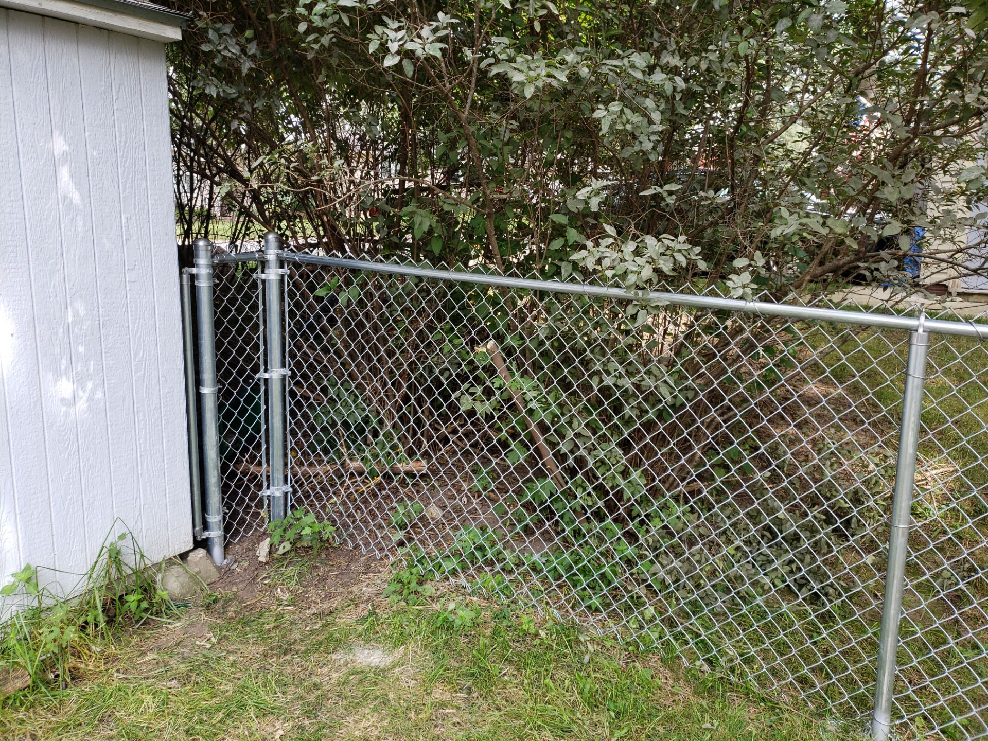 Galvanized Chain Link Backyard Fence and Gate Installation in Cedar Falls by Perfect Picket Fence and Stain
