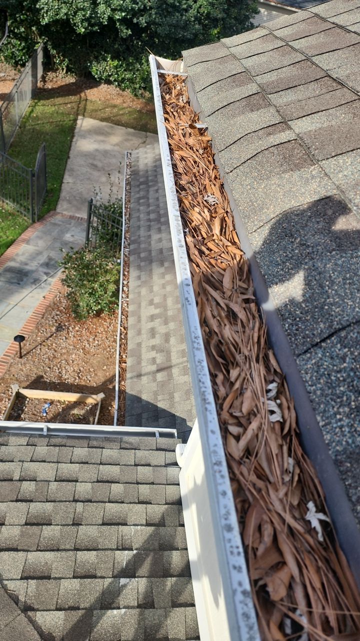 Gutter Cleaning using water by Power Wash Masters LLC
