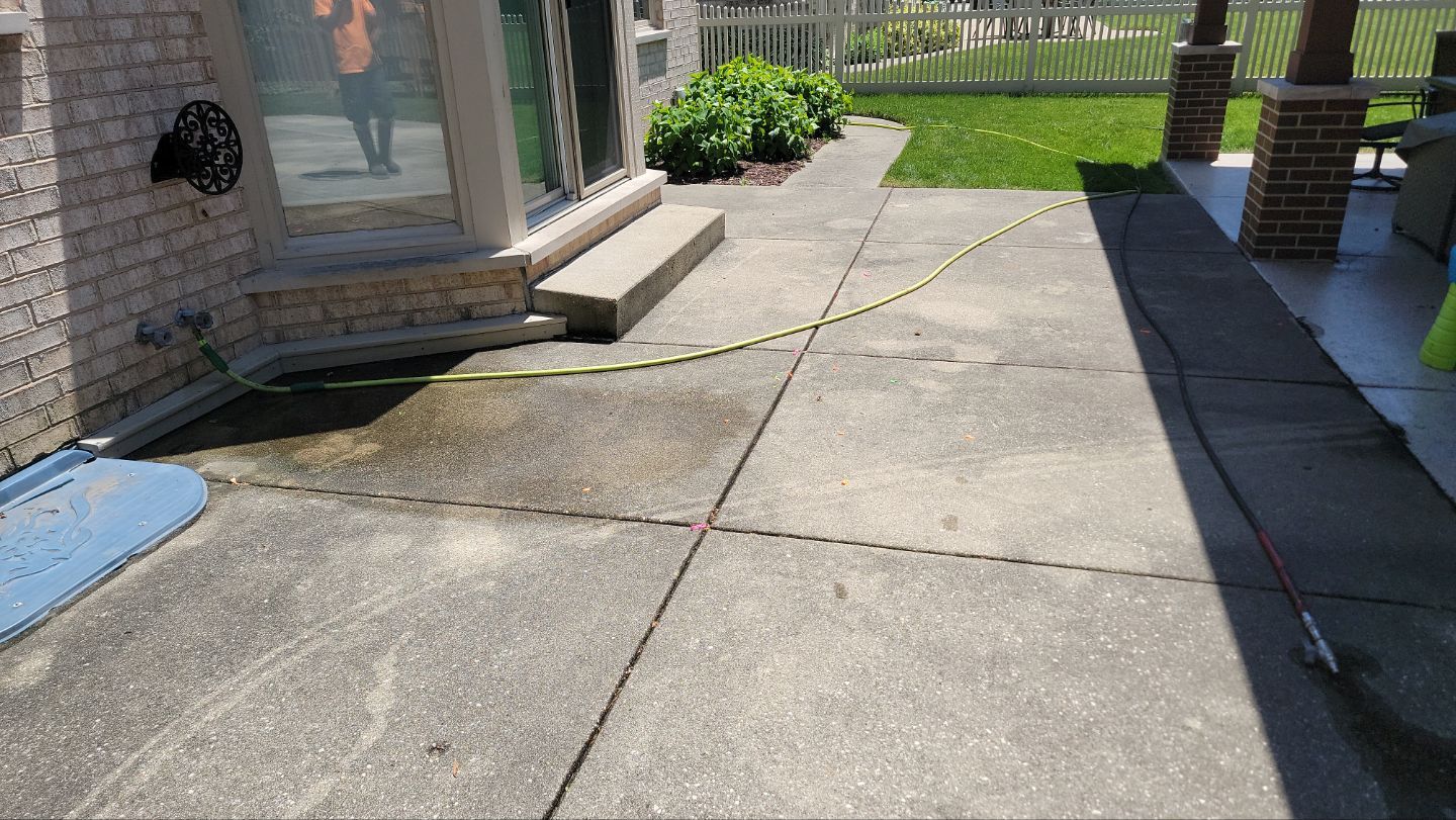 concrete power washing Algaecide, soft wash soap by Northern Power Washing LLC.