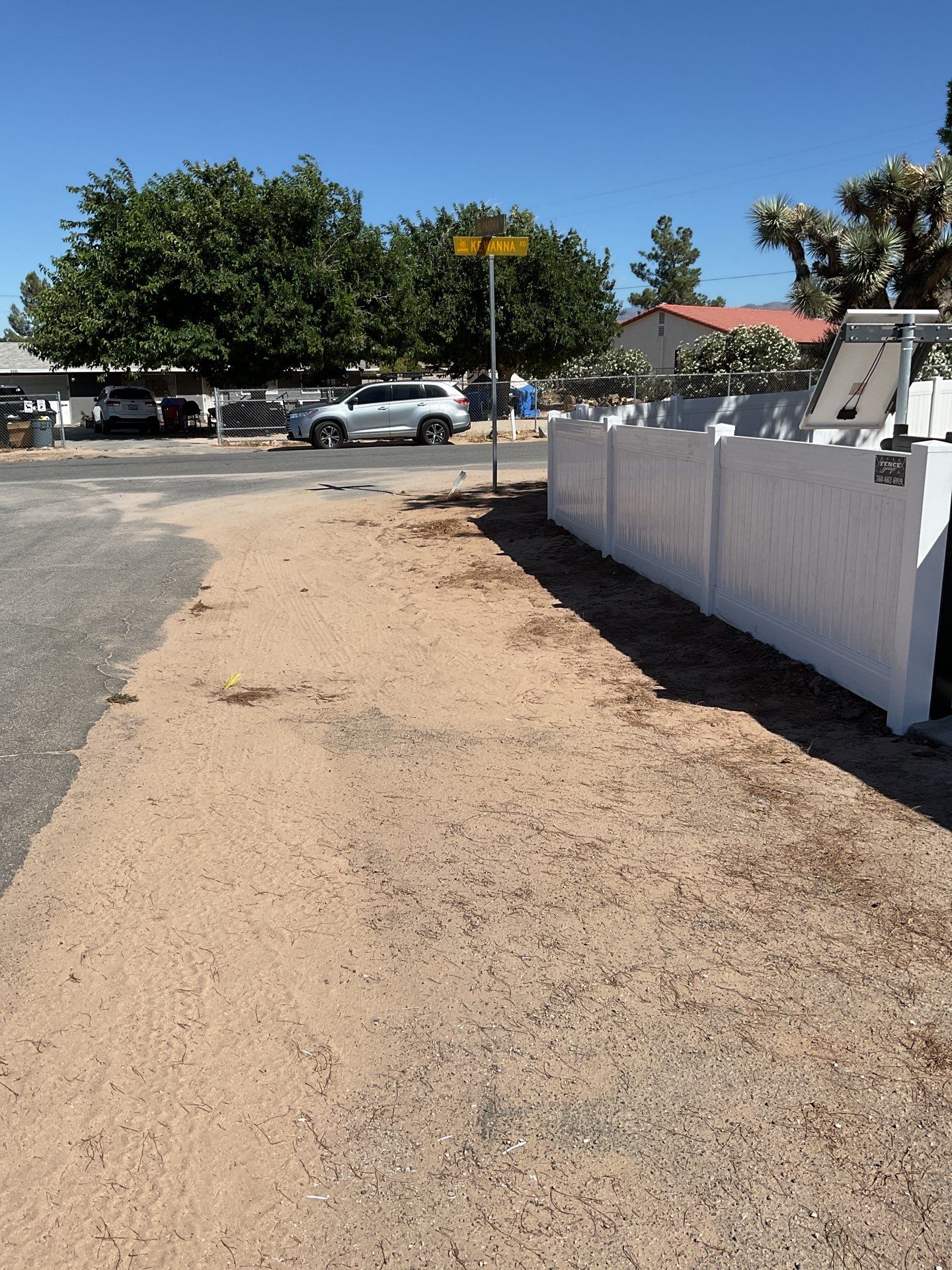 4ft White Vinyl Fence with Solar Power Motorized Gate by Fence Guys Inc.